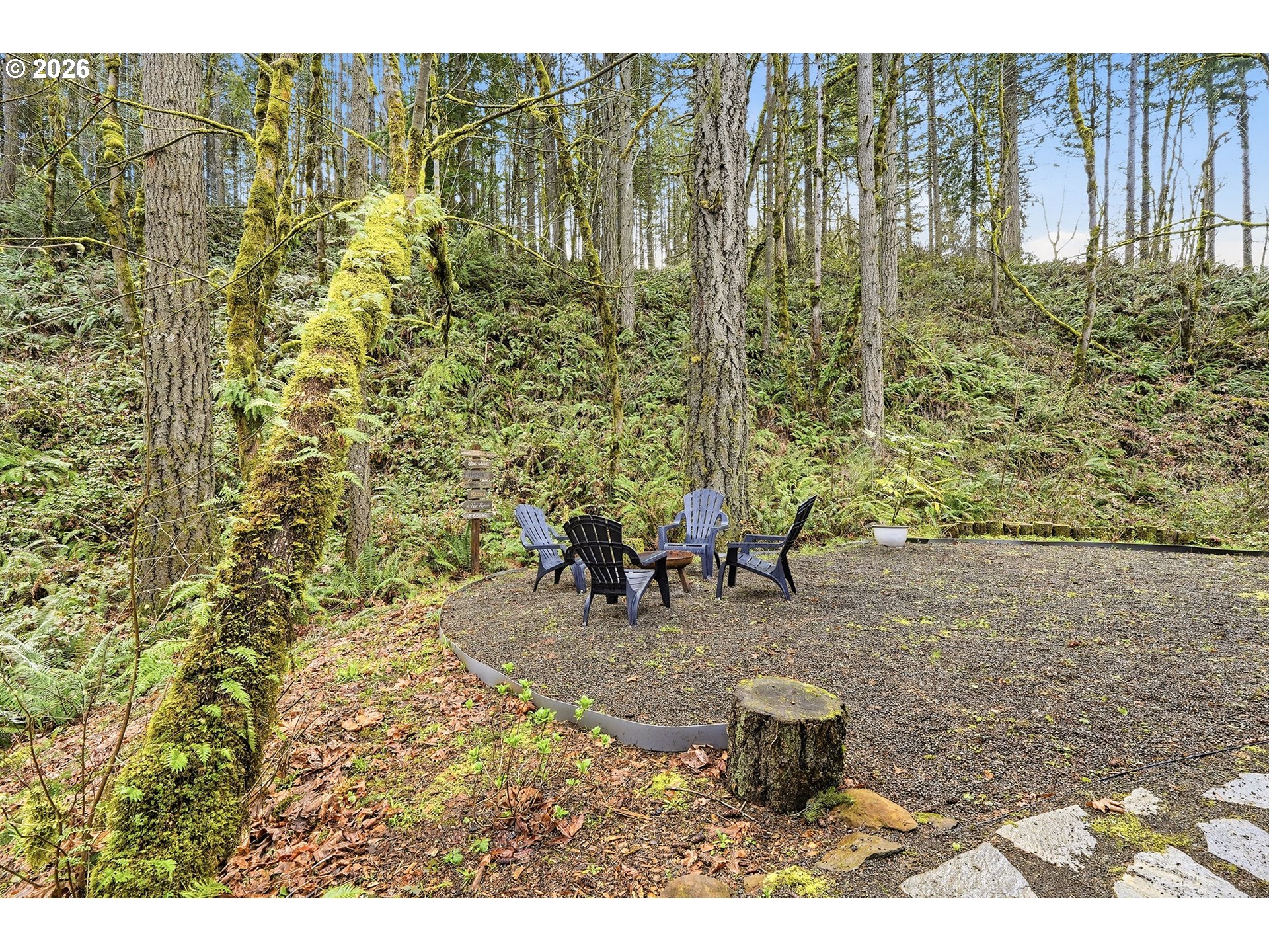 15680 South Wave Road Mulino, OR 97042 - Photo 36 of 43 a backyard of a house with table and chairs