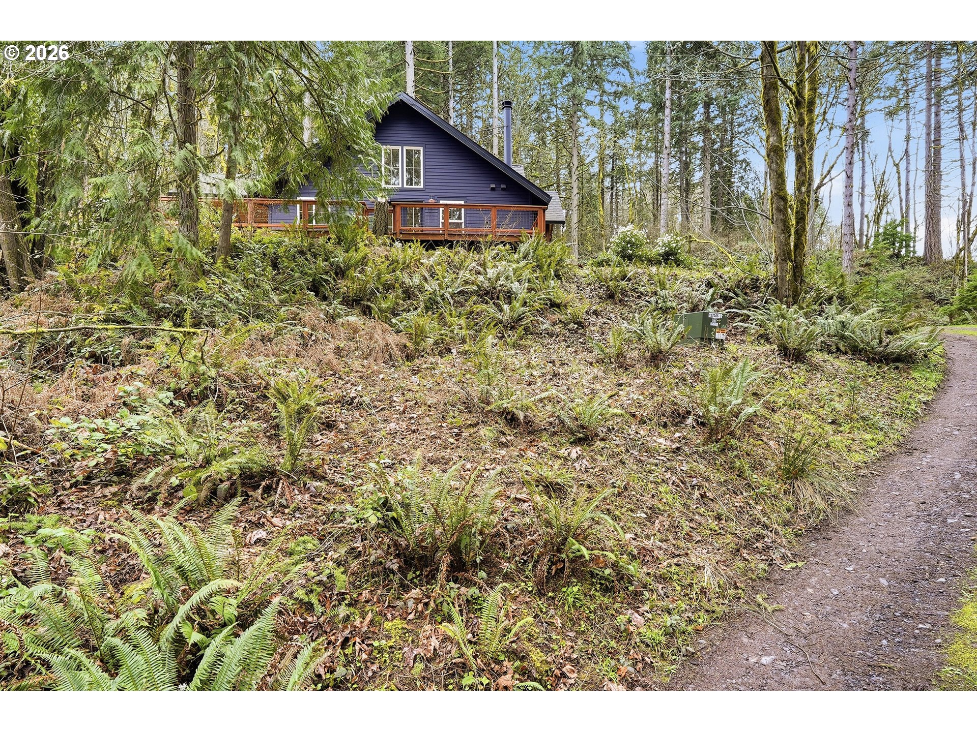 15680 South Wave Road Mulino, OR 97042 - Photo 38 of 43 a view of a barn in the middle of a yard