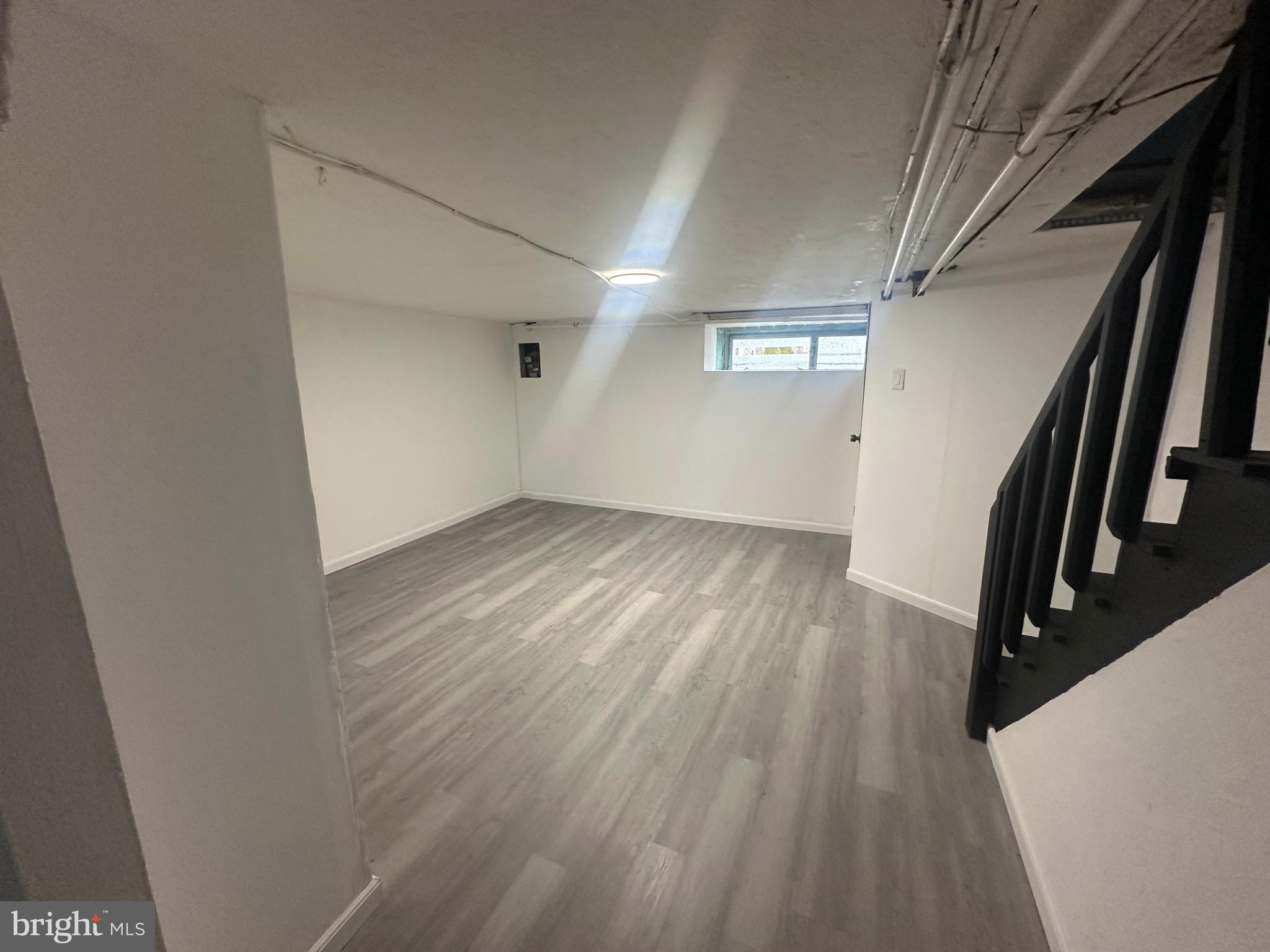 1440 Stirling Street Philadelphia, PA 19149 - Photo 14 of 18 wooden floor in an empty room with wooden floor