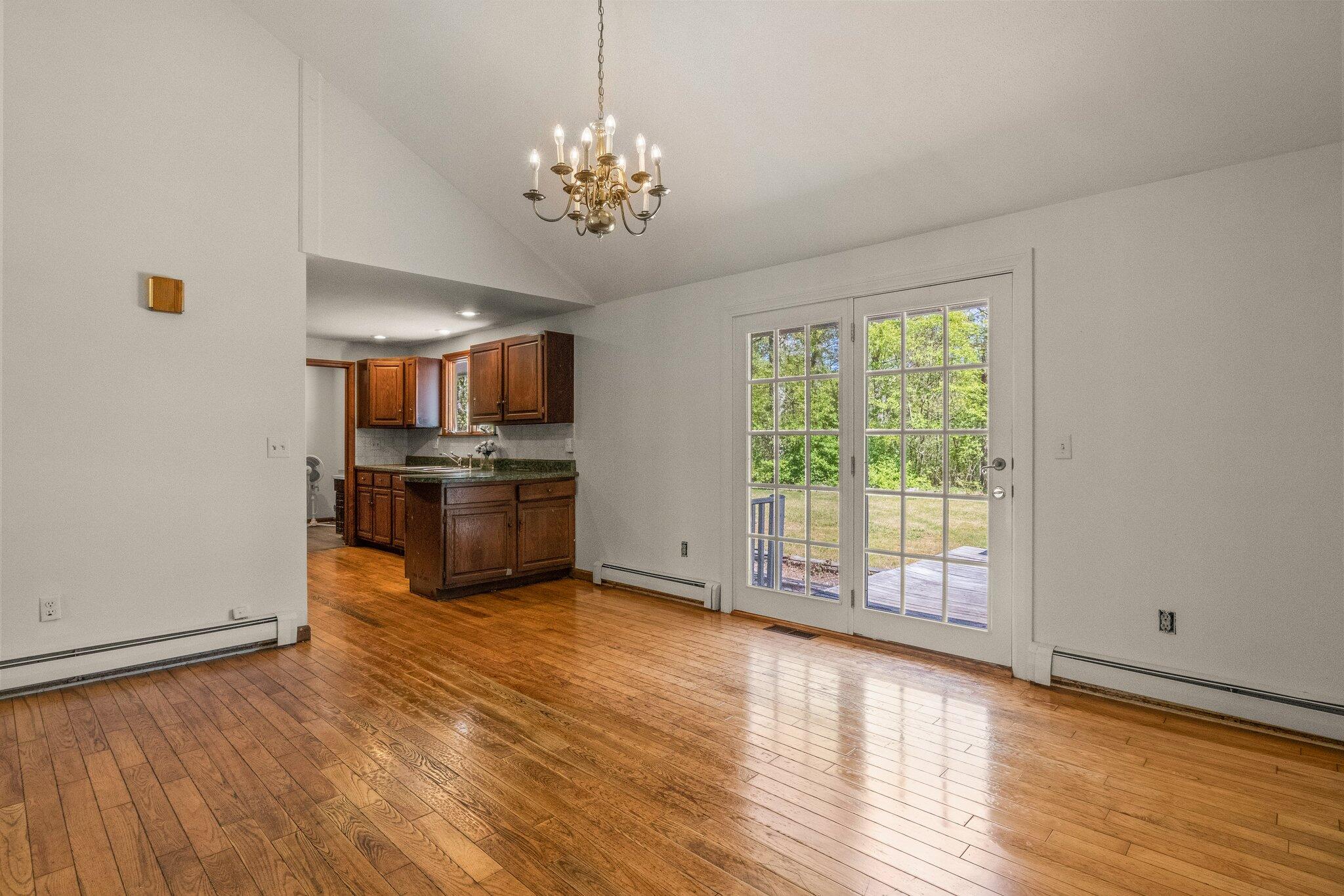 472 Elliott Road Centerville, MA 02632 - Photo 11 of 36 a view of a kitchen with microwave and stove