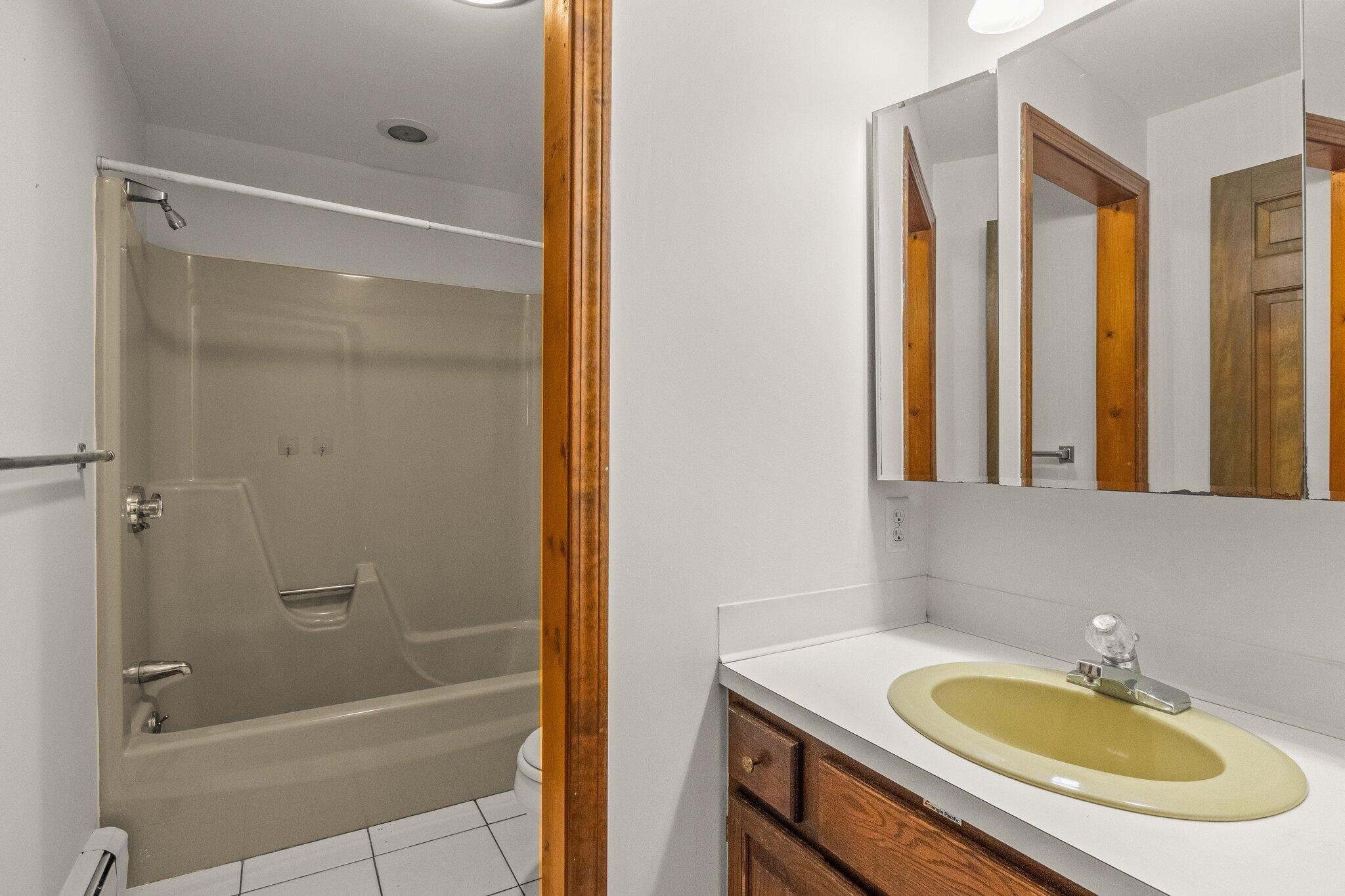 472 Elliott Road Centerville, MA 02632 - Photo 18 of 36 a bathroom with a sink and a mirror