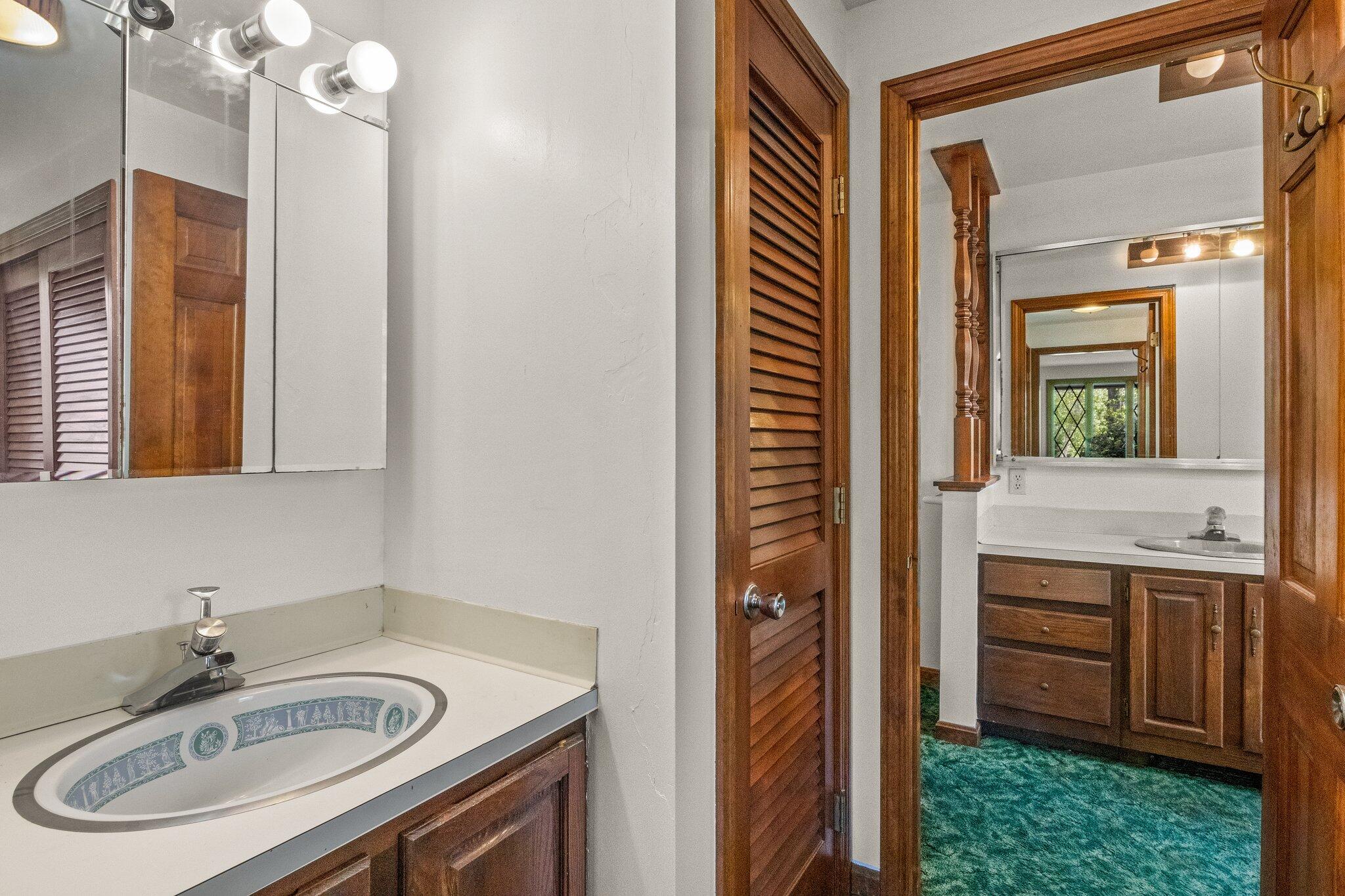472 Elliott Road Centerville, MA 02632 - Photo 25 of 36 a bathroom with a sink and a mirror