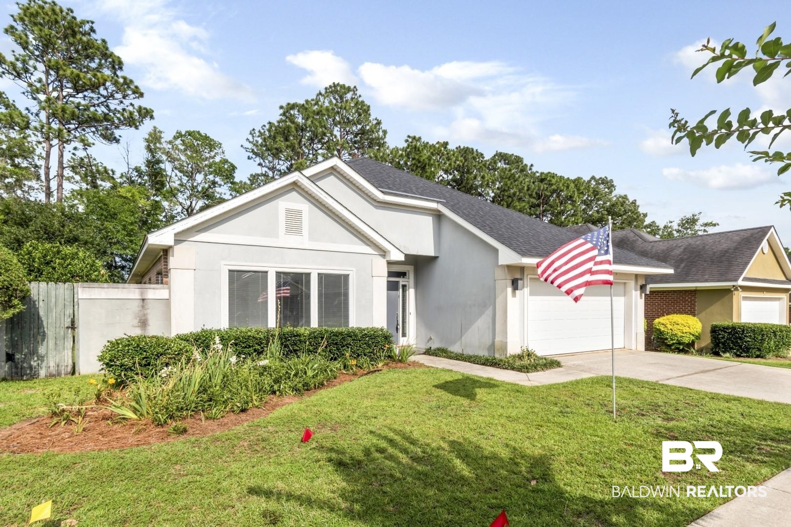 1205 Hillcrest Crossing East Mobile, AL 36695 - Photo 4 of 40 Ranch-style home featuring a garage and a front yard