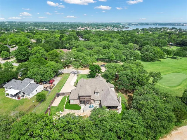 an aerial view of a house with yard and outdoor space