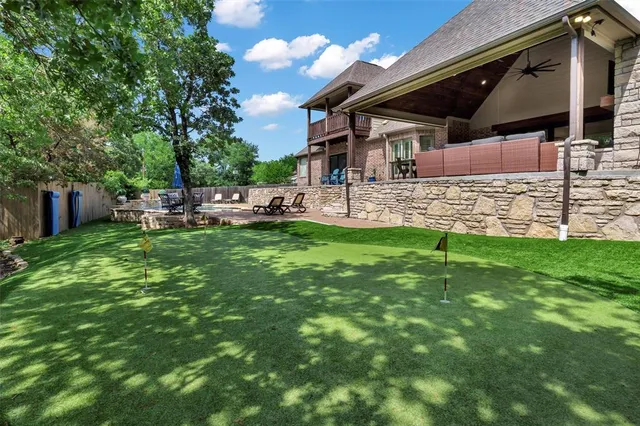 a view of a house with a yard porch and sitting area