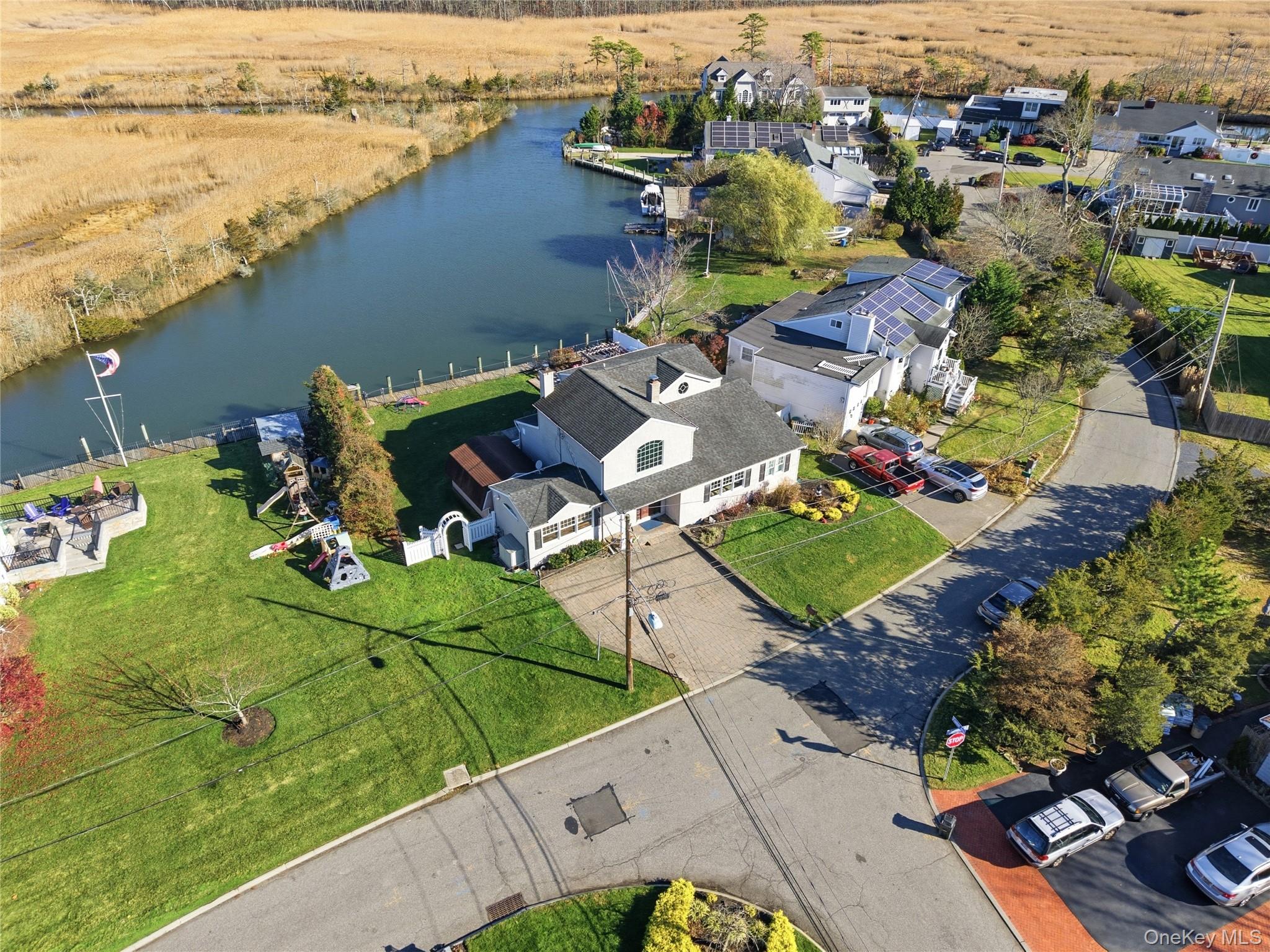 625 Edgewater Road Oakdale, NY 11769 - Photo 44 of 49 Aerial perspective of suburban area