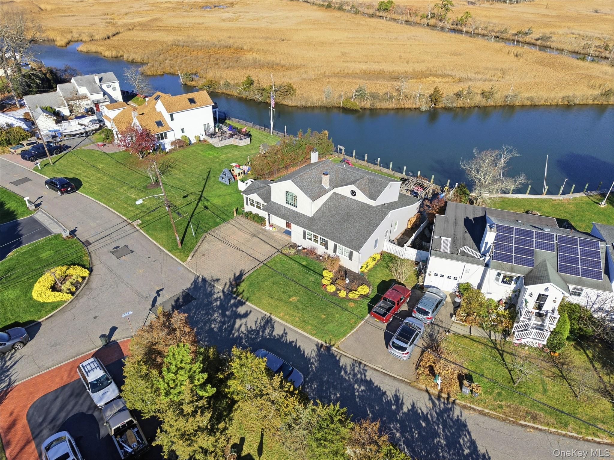 625 Edgewater Road Oakdale, NY 11769 - Photo 47 of 49 Drone / aerial view of a large body of water