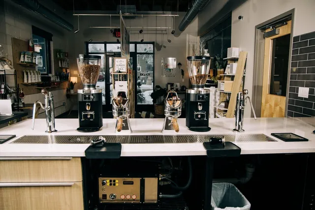 a room with table and chairs