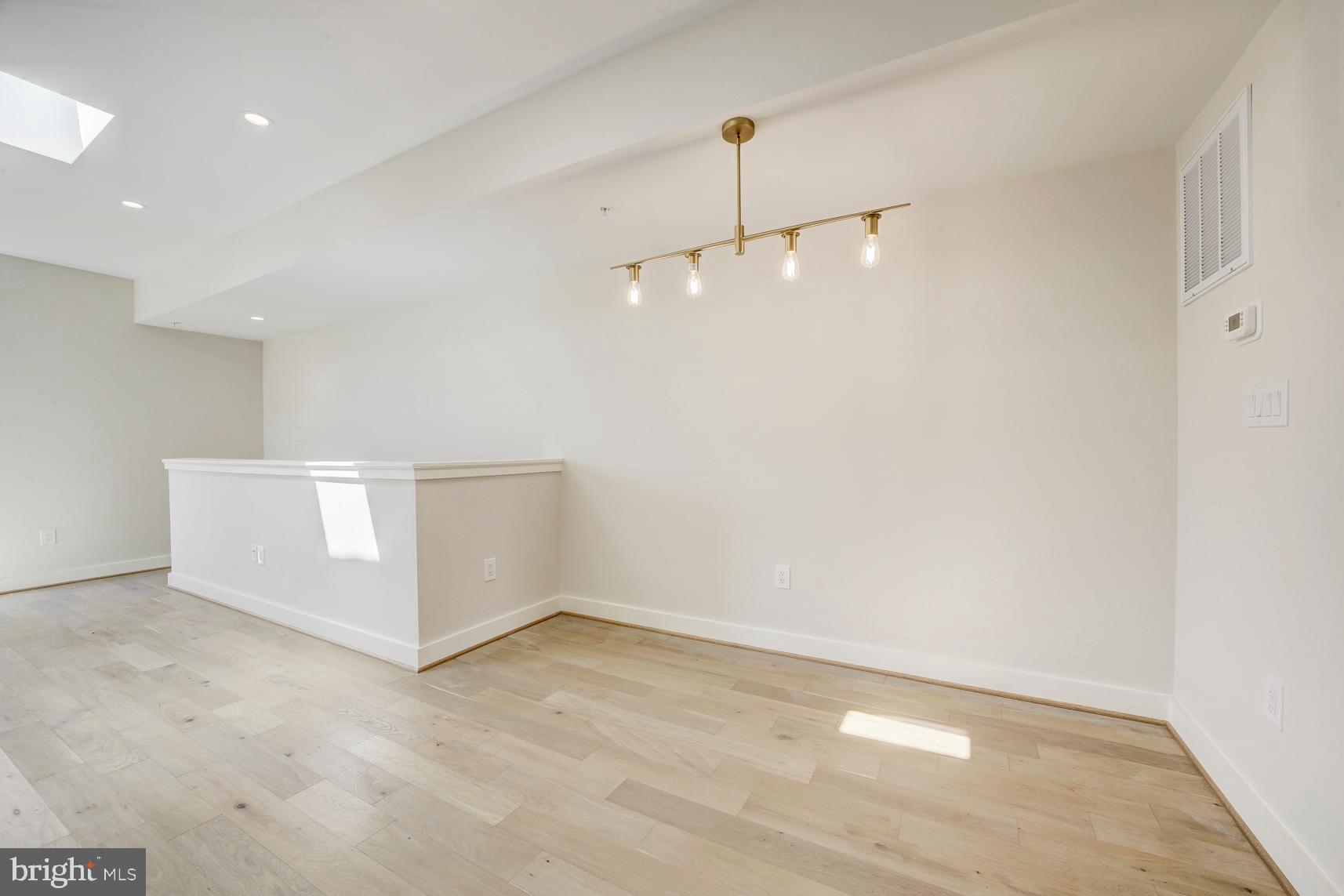 3118 Mt Pleasant Street Northwest, Unit 3 Washington, DC 20010 - Photo 6 of 16 a view of an empty room