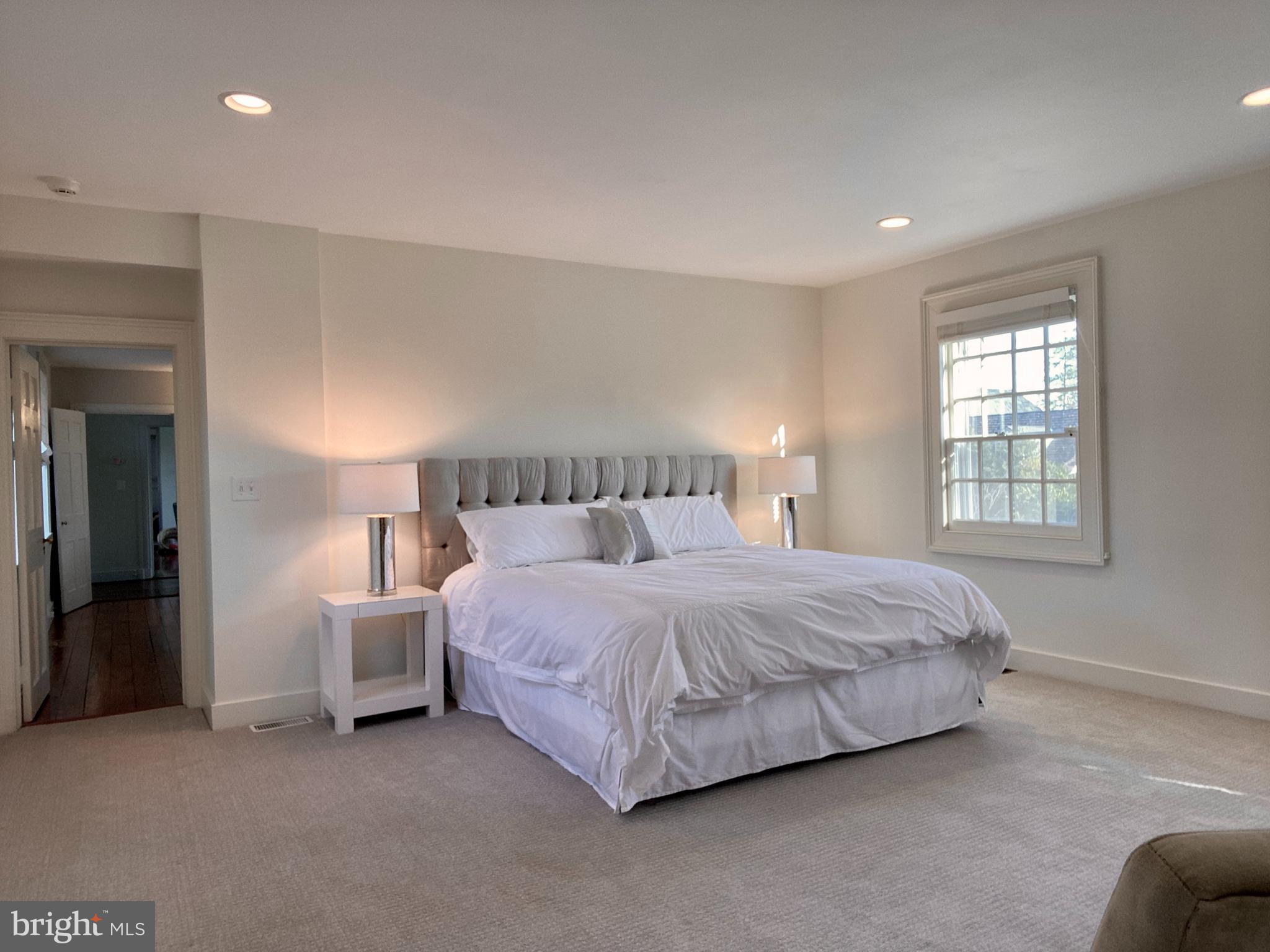 121 Upnor Road Baltimore, MD 21212 - Photo 45 of 79 a spacious bedroom with a bed and a window