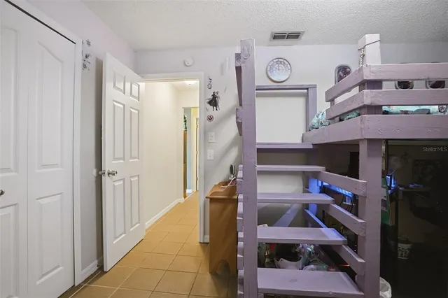 a room that has a lot of stuff and cabinets