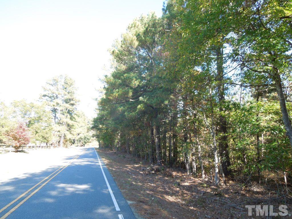 Mcduffie Road Biscoe, NC 27209 - Photo 7 of 15 a view of a yard with plants and trees