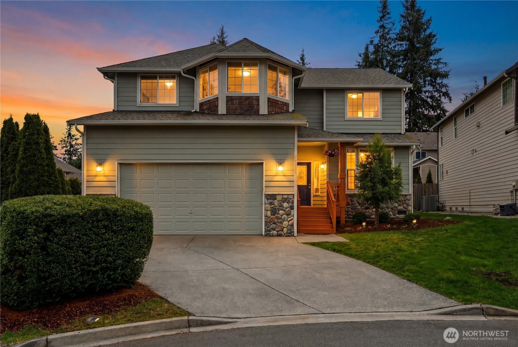 24115 22nd Place West Bothell, WA 98021 - Photo 1 of 40 a front view of a house with garden
