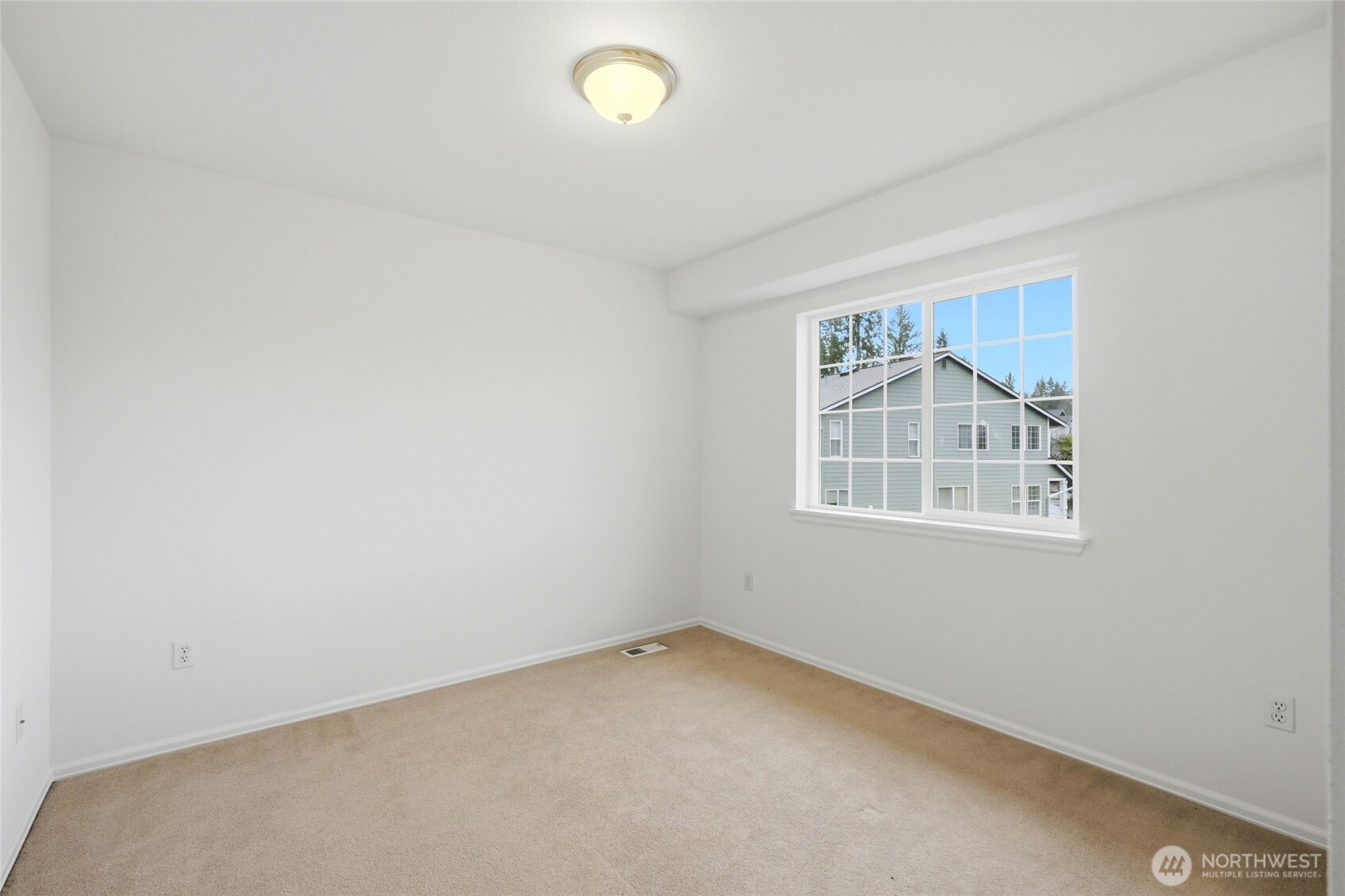 24115 22nd Place West Bothell, WA 98021 - Photo 29 of 40 an empty room with windows
