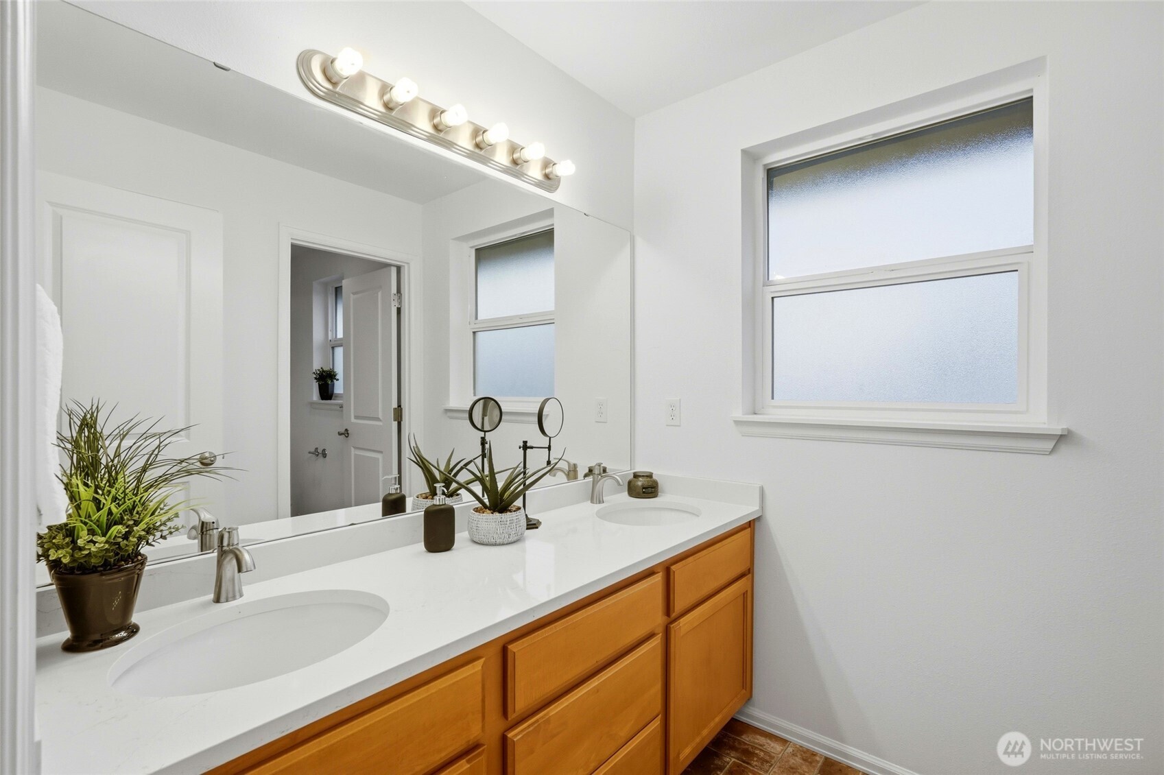 24115 22nd Place West Bothell, WA 98021 - Photo 32 of 40 a bathroom with a sink a vanity and a mirror