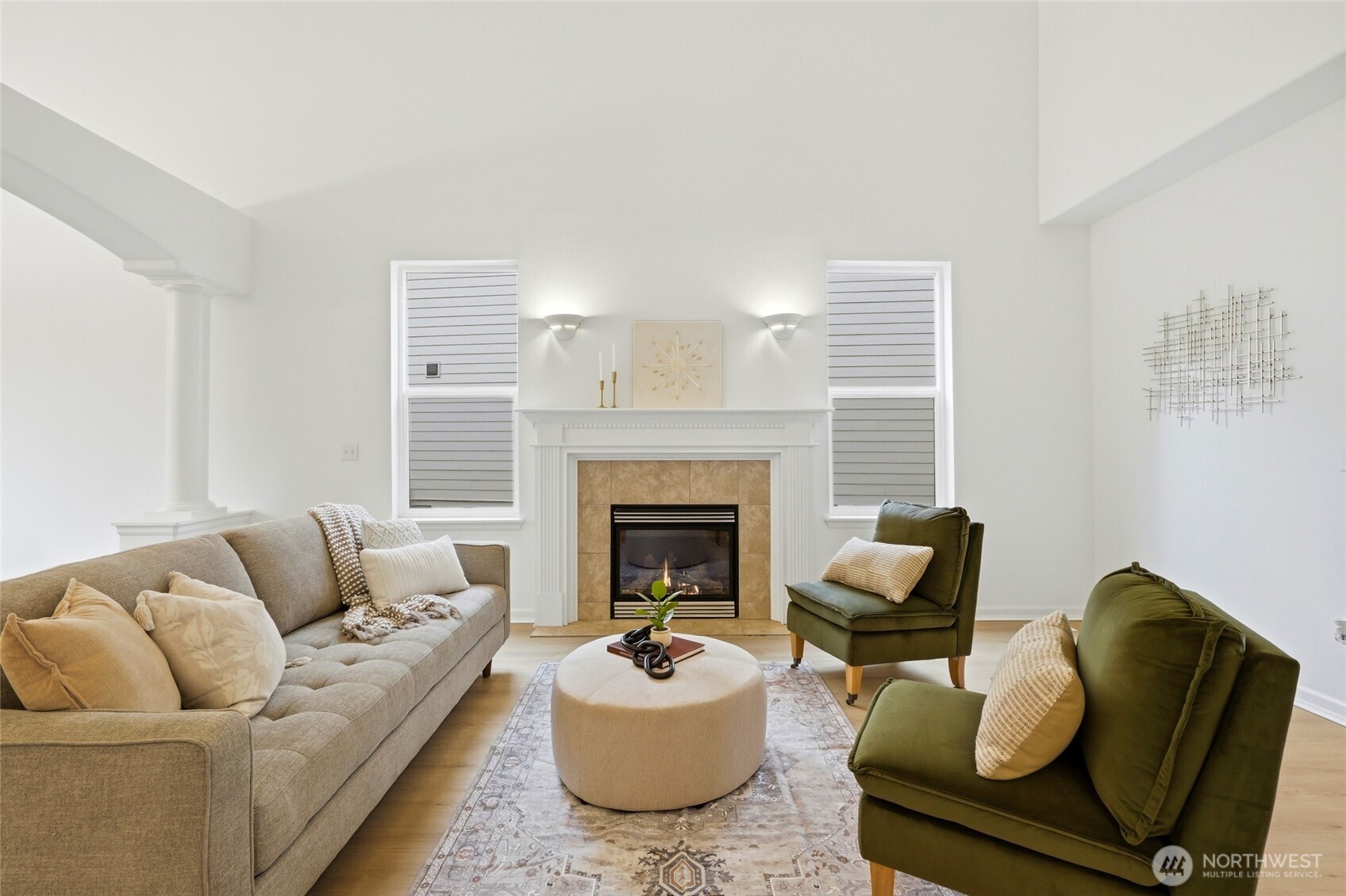 24115 22nd Place West Bothell, WA 98021 - Photo 5 of 40 a living room with furniture and a fireplace