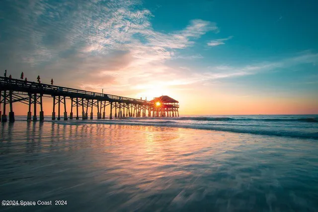 a view of swimming pool with outdoor seating