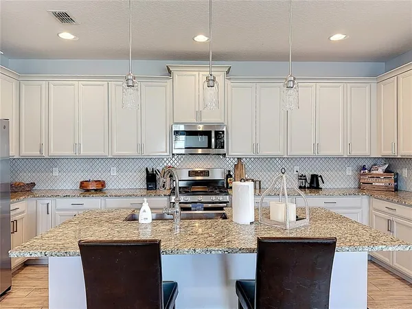 a view of front door with chair and bench