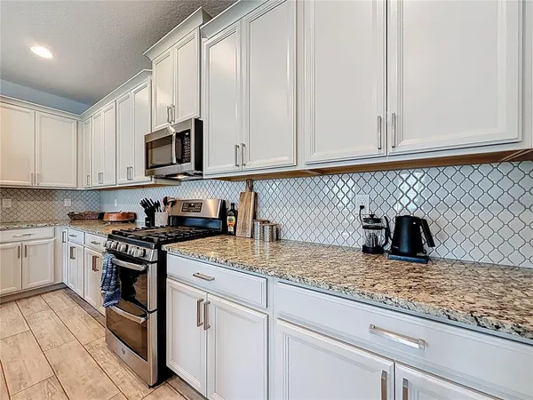$649,999 | 8150 Gray Kingbird Drive, Winter Garden, FL 34787