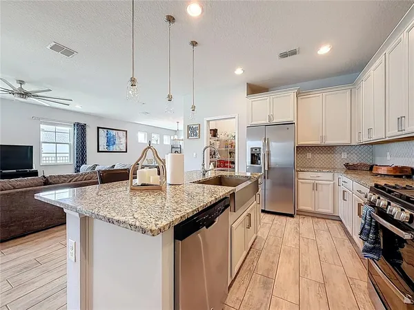$649,999 | 8150 Gray Kingbird Drive, Winter Garden, FL 34787