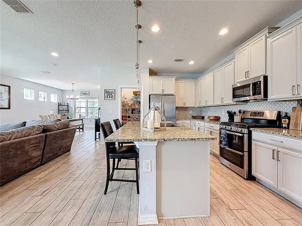 $649,999 | 8150 Gray Kingbird Drive, Winter Garden, FL 34787