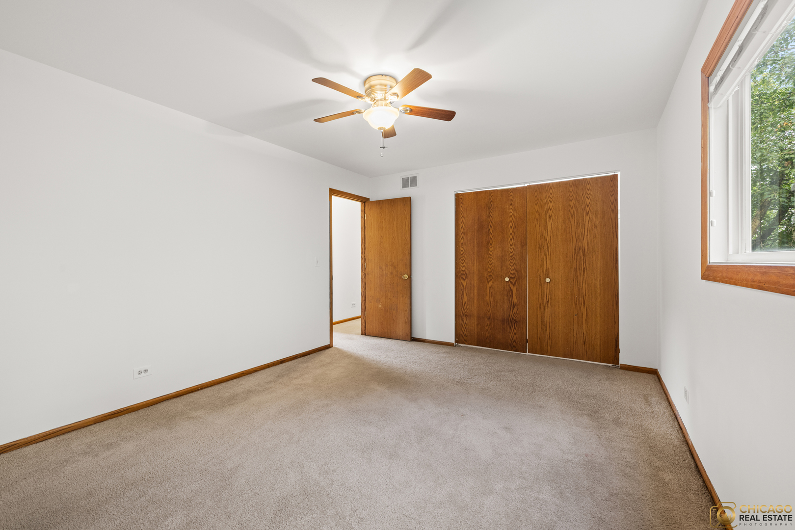 26235 North Acorn Lane Mundelein, IL 60060 - Photo 12 of 24 an empty room with fan and windows