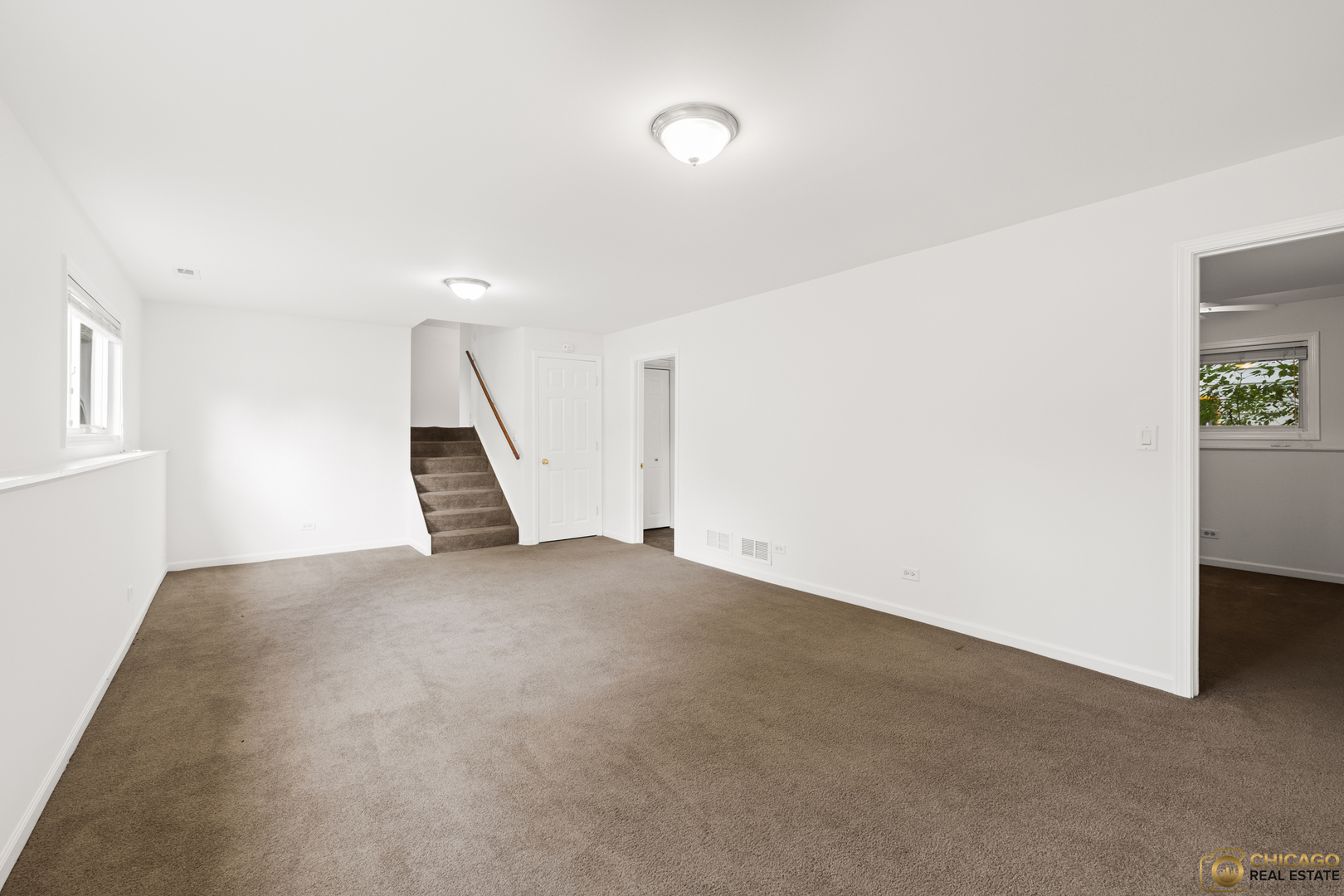 26235 North Acorn Lane Mundelein, IL 60060 - Photo 17 of 24 a view of an empty room with stairs
