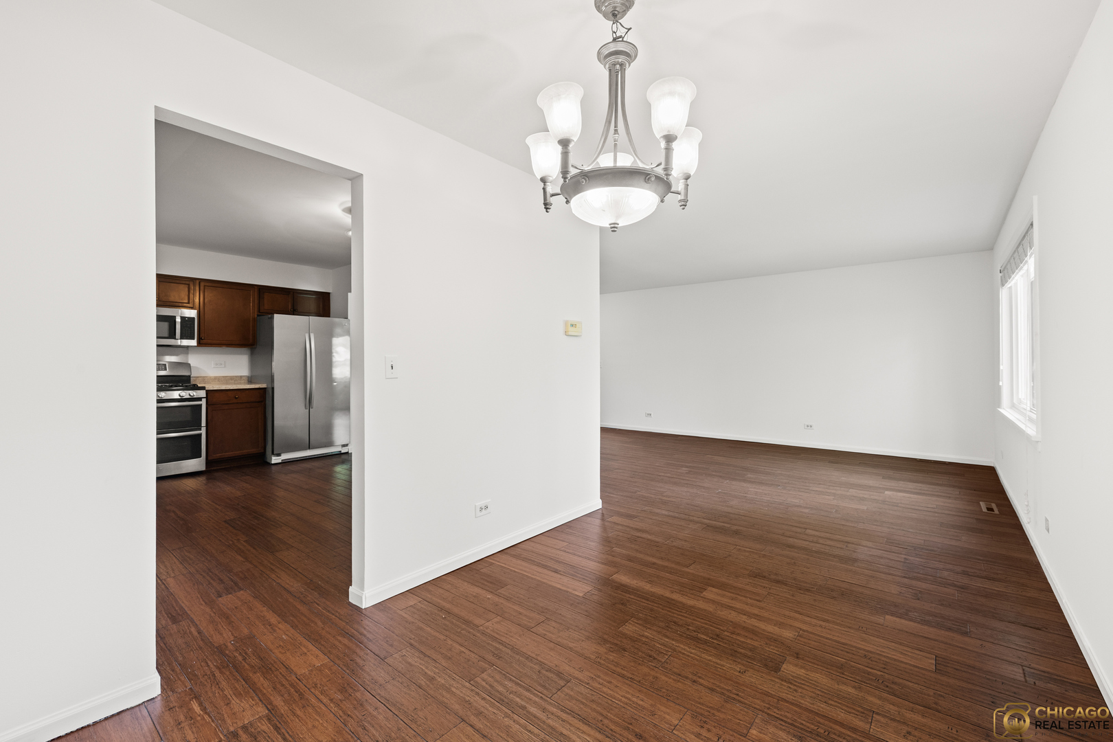 26235 North Acorn Lane Mundelein, IL 60060 - Photo 7 of 24 a view of a livingroom with wooden floor