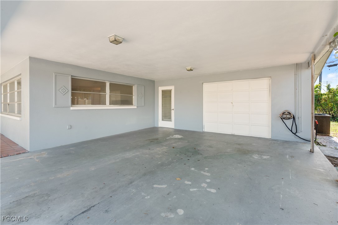 1450 Charles Road Fort Myers, FL 33919 - Photo 23 of 23 a view of an empty room with a window