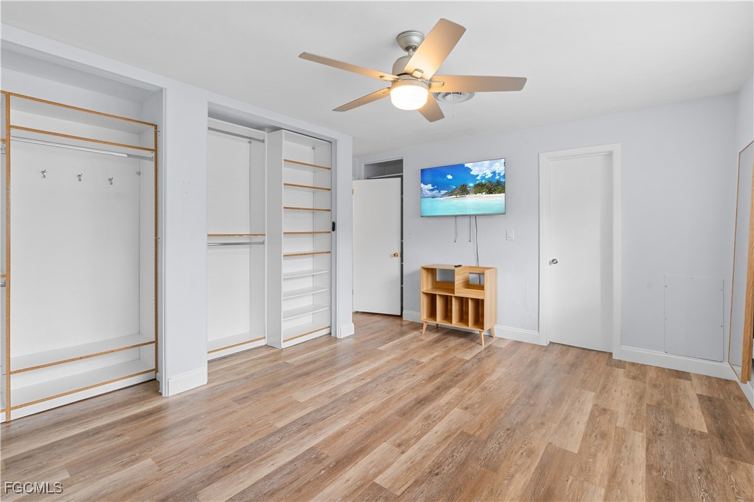 1450 Charles Road Fort Myers, FL 33919 - Photo 10 of 23 an empty room with closet and windows