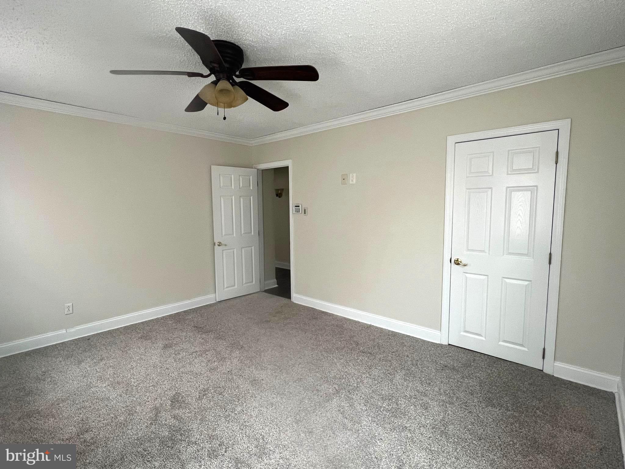 301 Pemberton Road Southampton, NJ 08088 - Photo 14 of 29 a view of empty room with a ceiling fan