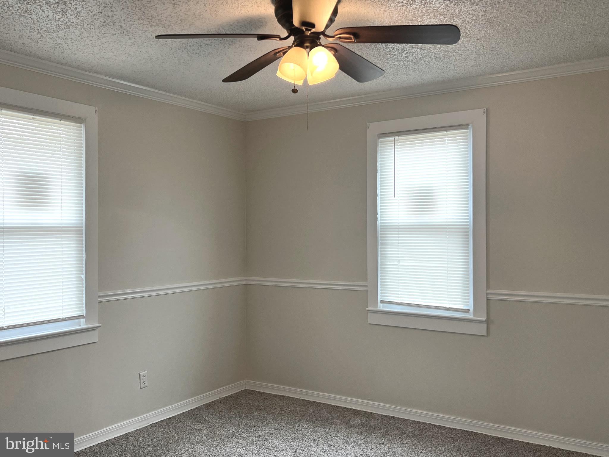 301 Pemberton Road Southampton, NJ 08088 - Photo 17 of 29 an empty room with a window and a fan