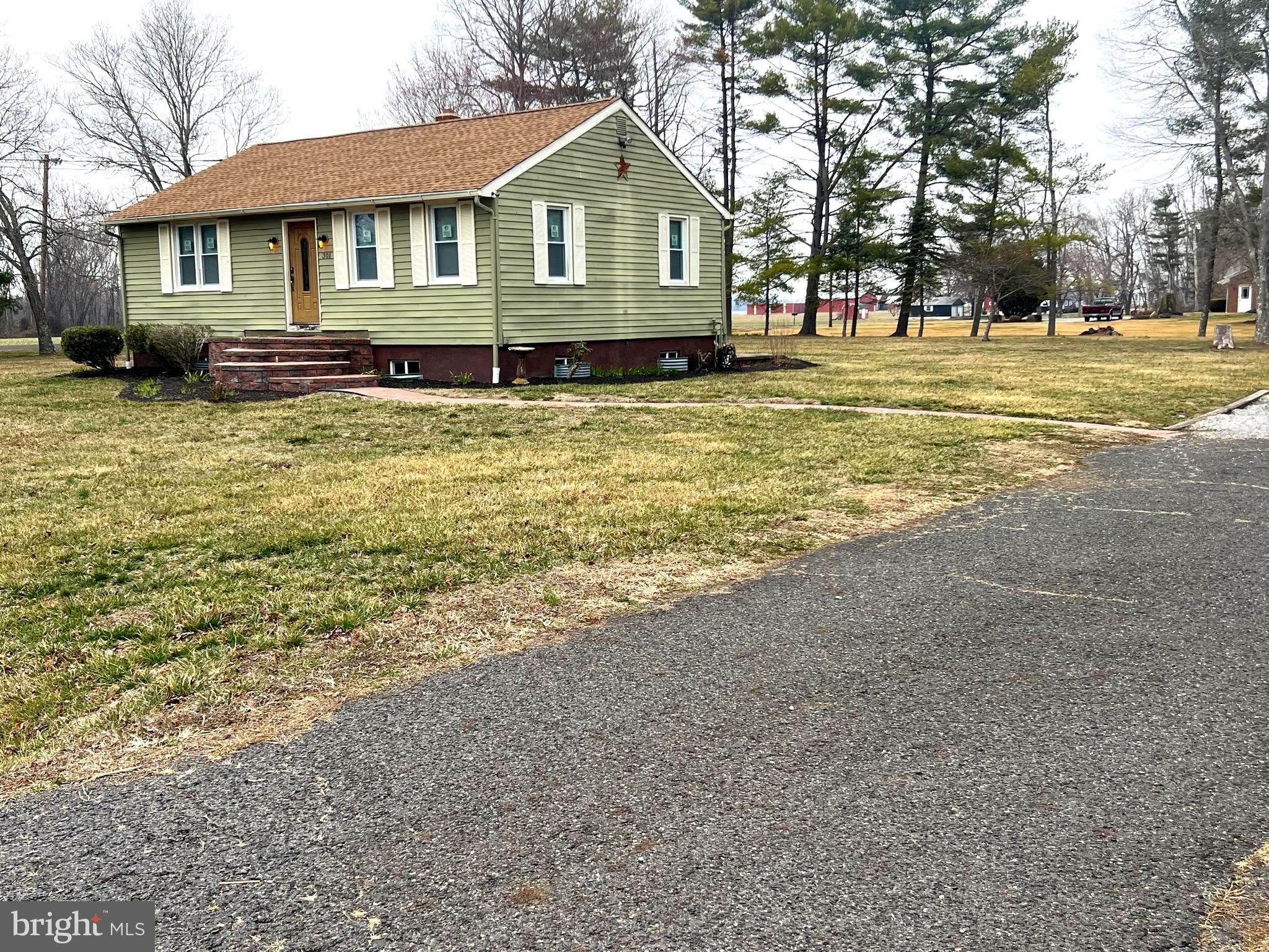 301 Pemberton Road Southampton, NJ 08088 - Photo 23 of 29 a front view of a house with a yard