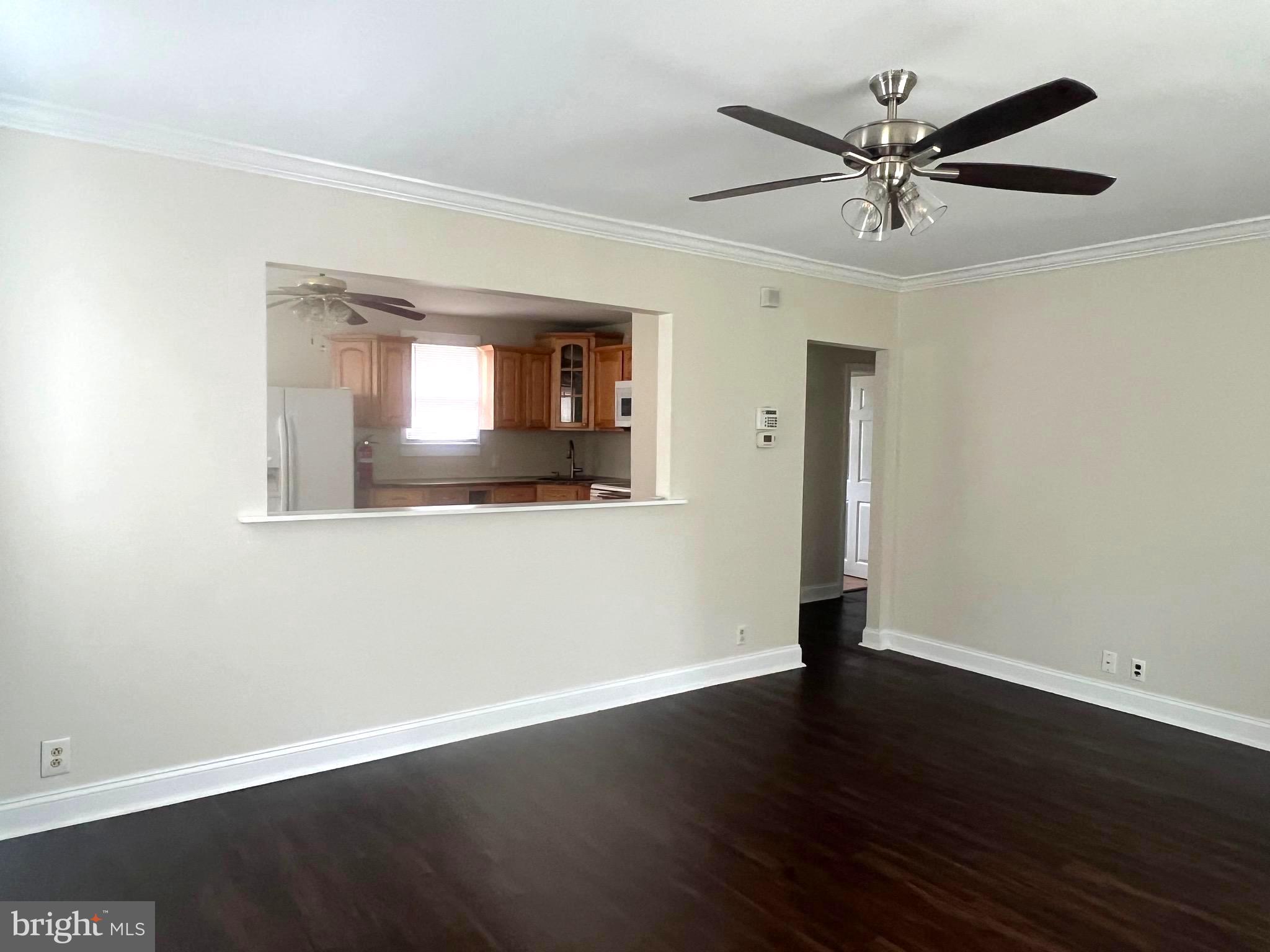 301 Pemberton Road Southampton, NJ 08088 - Photo 4 of 29 a view of a room with wooden floor and a ceiling fan