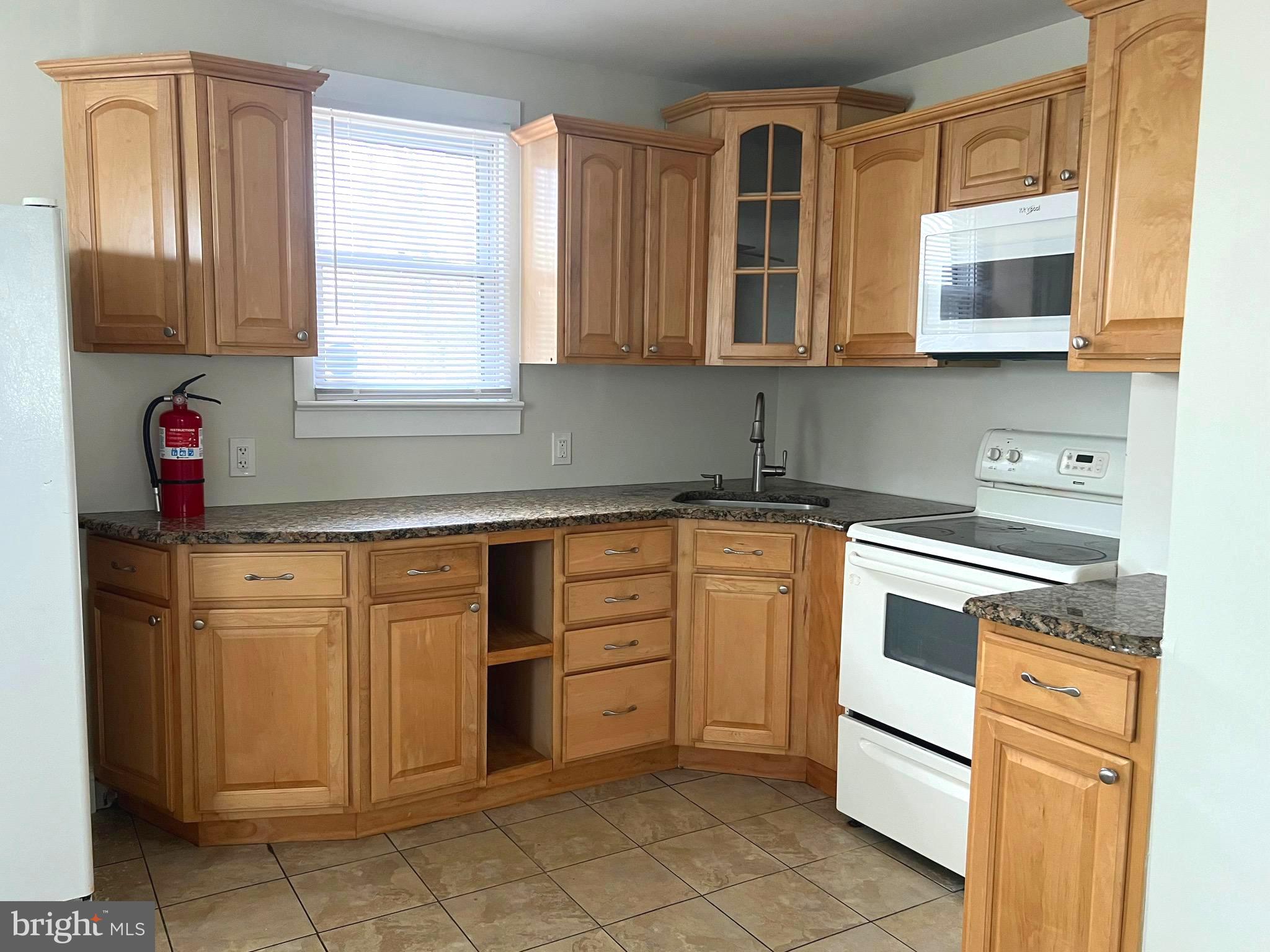 301 Pemberton Road Southampton, NJ 08088 - Photo 5 of 29 a kitchen with stainless steel appliances granite countertop a refrigerator and cabinets
