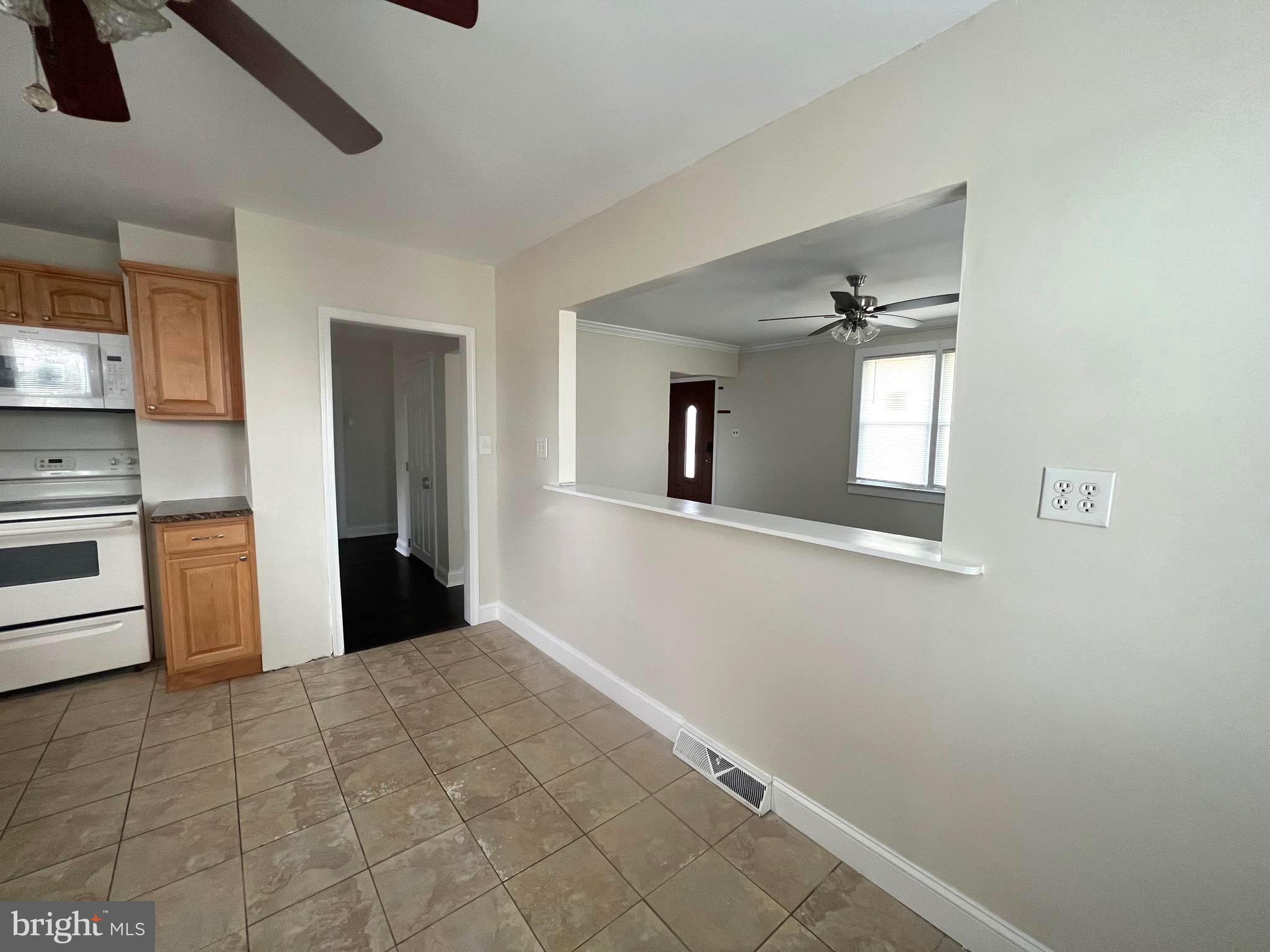 301 Pemberton Road Southampton, NJ 08088 - Photo 7 of 29 a view of an empty room with a kitchen