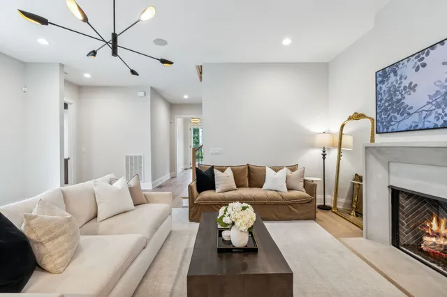 a kitchen with stainless steel appliances granite countertop a sink and cabinets