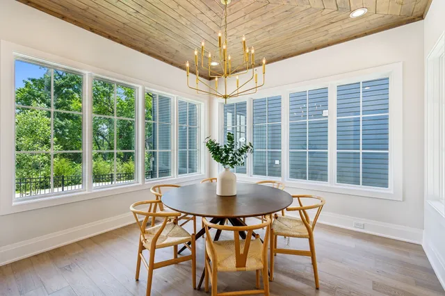 a white bath tub sitting next to a window