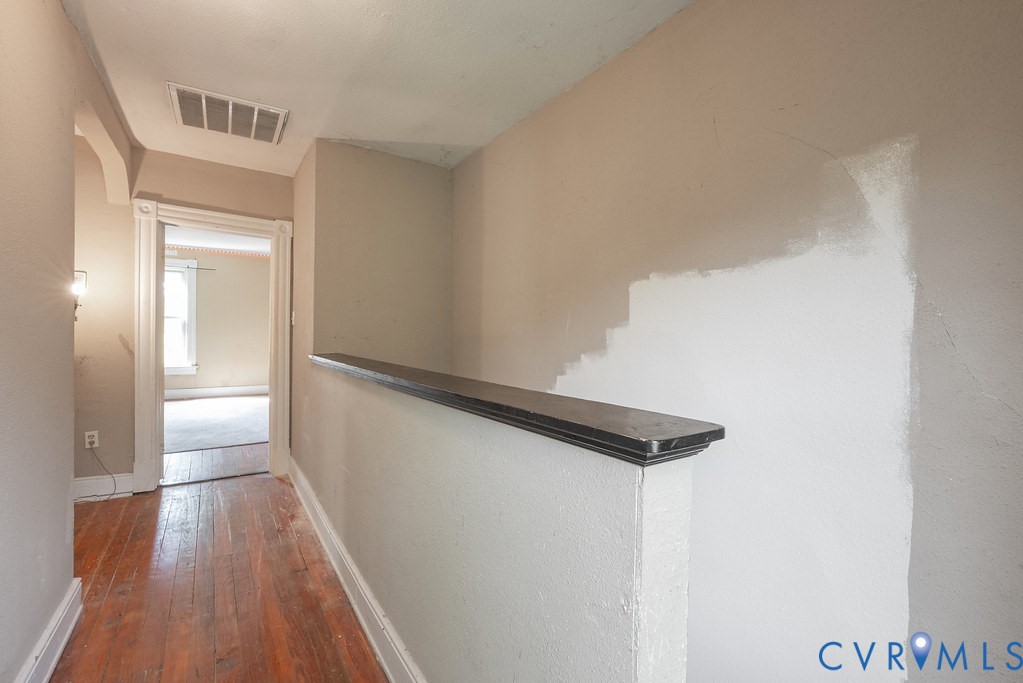 17033 North Telegraph Road Doswell, VA 23047 - Photo 9 of 12 a view of a hallway with wooden floor