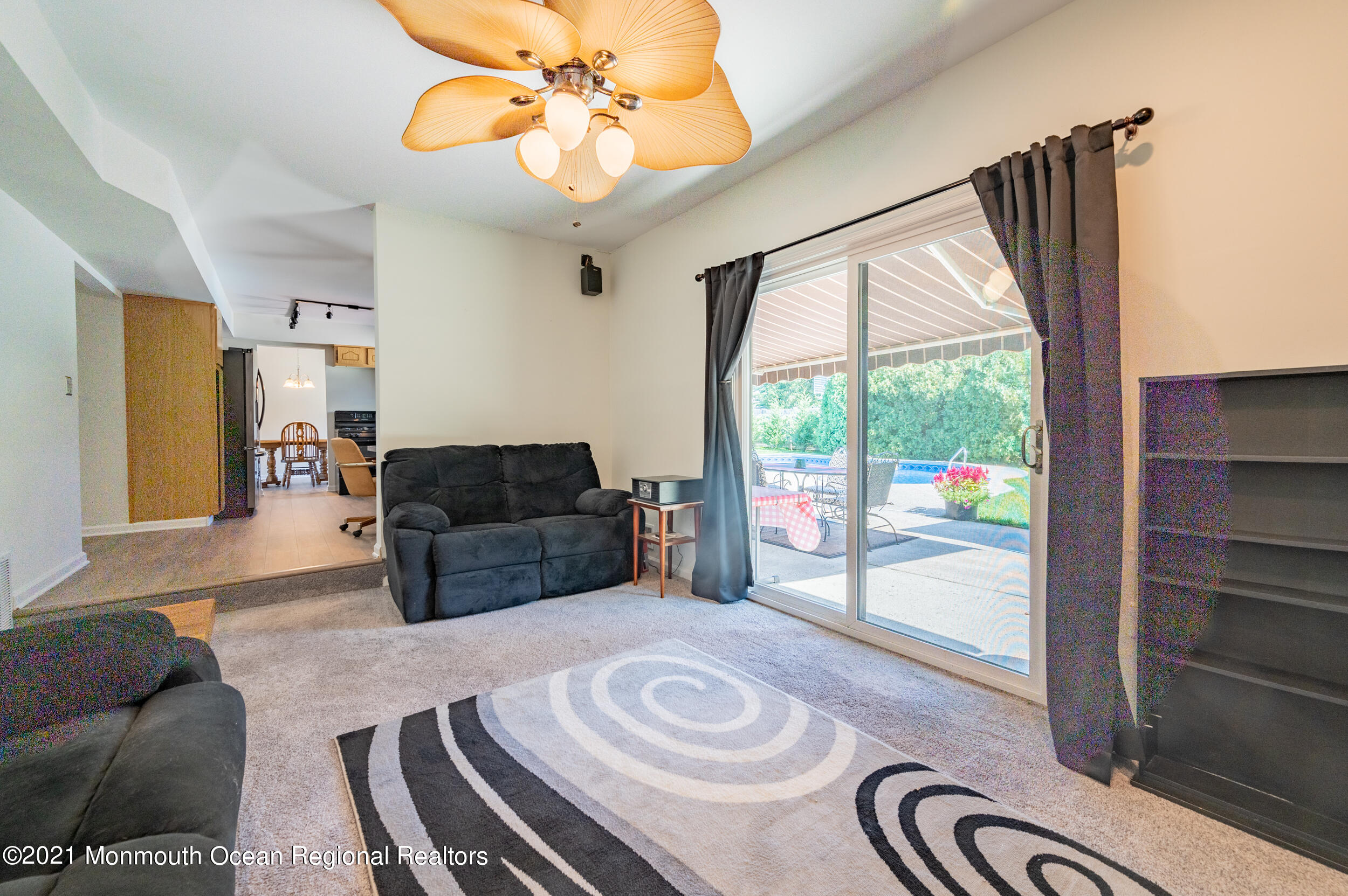 7 New Friendship Road Howell, NJ 07731 - Photo 11 of 26 a living room with a couch and a large window