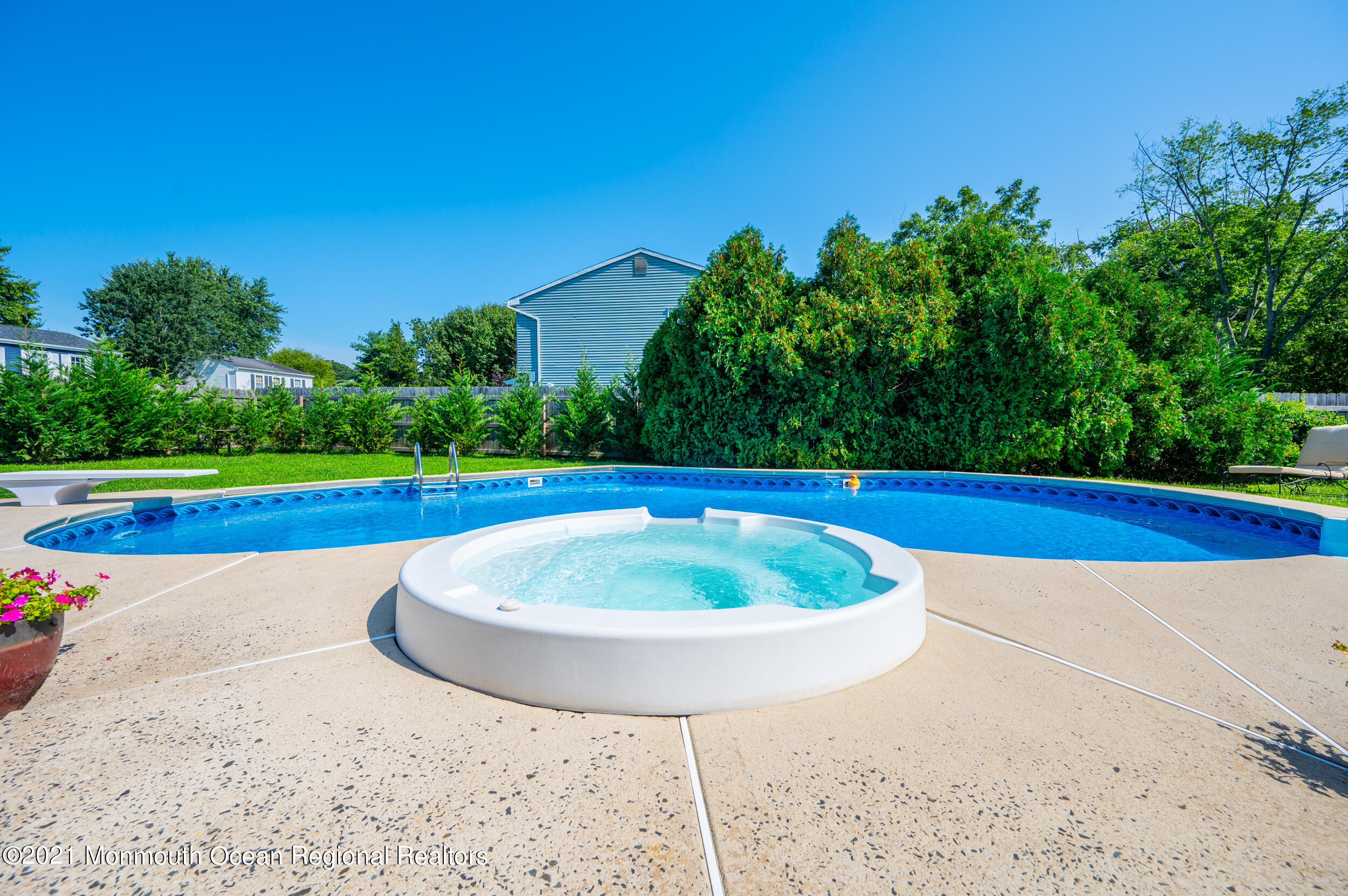 7 New Friendship Road Howell, NJ 07731 - Photo 15 of 26 a view of a swimming pool with a yard
