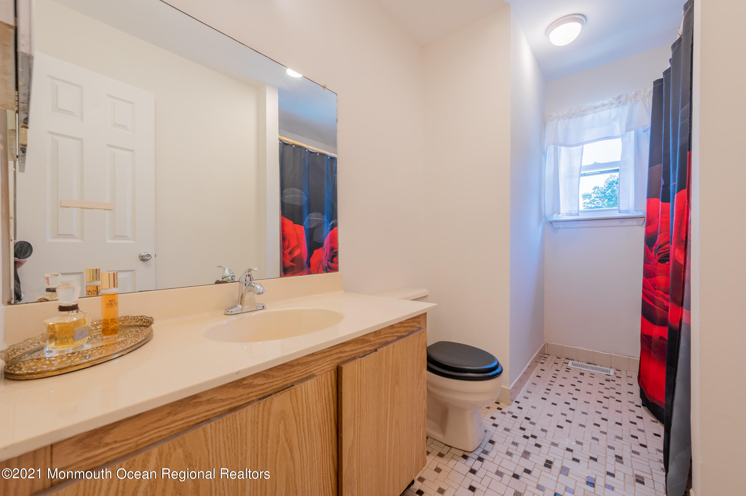 7 New Friendship Road Howell, NJ 07731 - Photo 21 of 26 a bathroom with a sink toilet vanity and granite