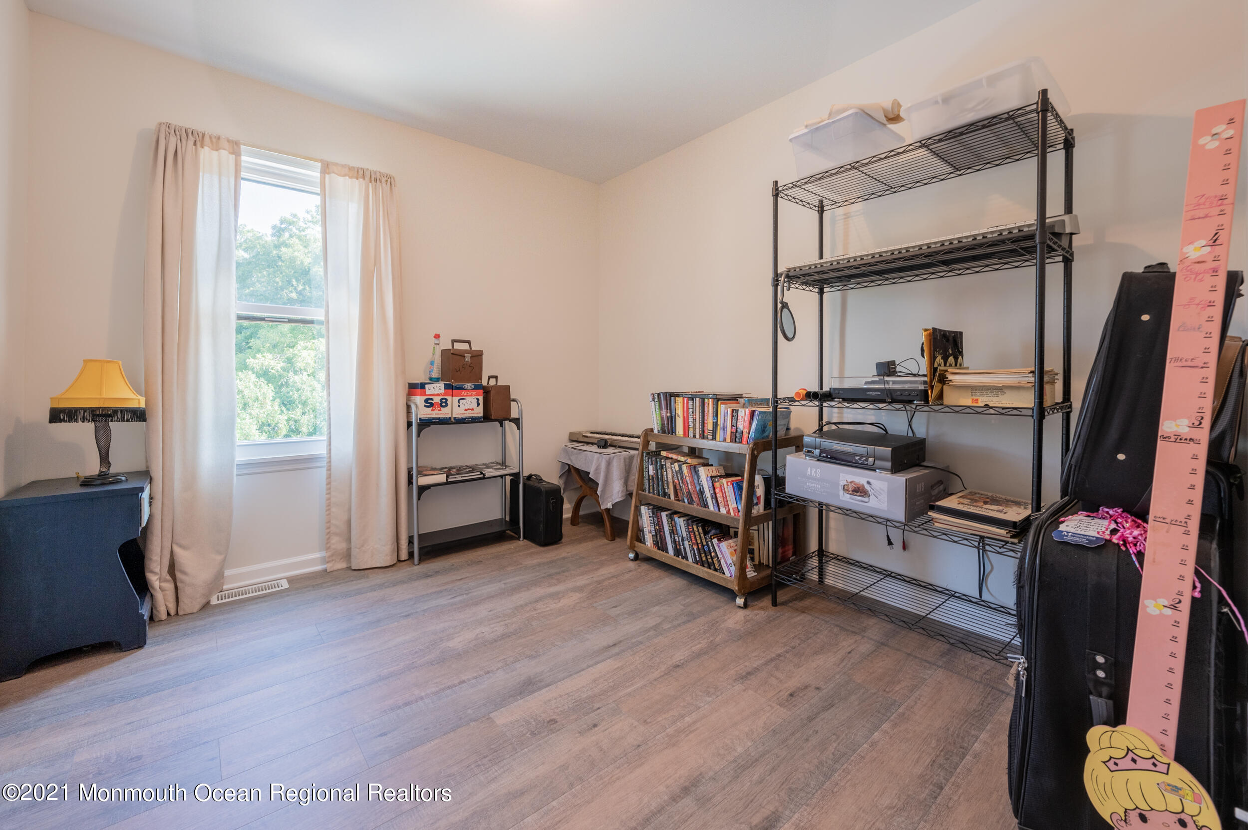 7 New Friendship Road Howell, NJ 07731 - Photo 23 of 26 a view of a workspace with furniture and a window