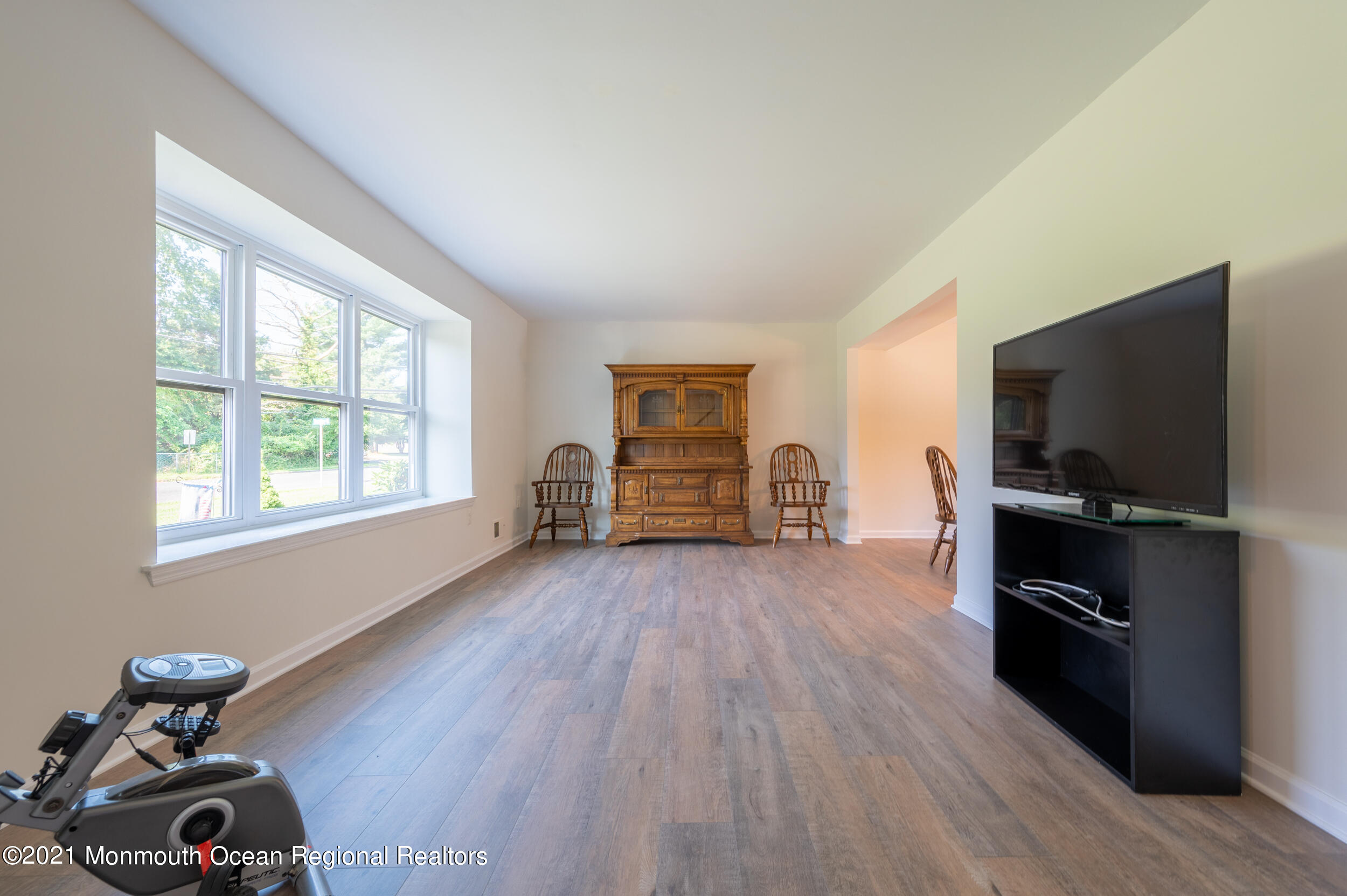 7 New Friendship Road Howell, NJ 07731 - Photo 5 of 26 a living room with furniture and a flat screen tv