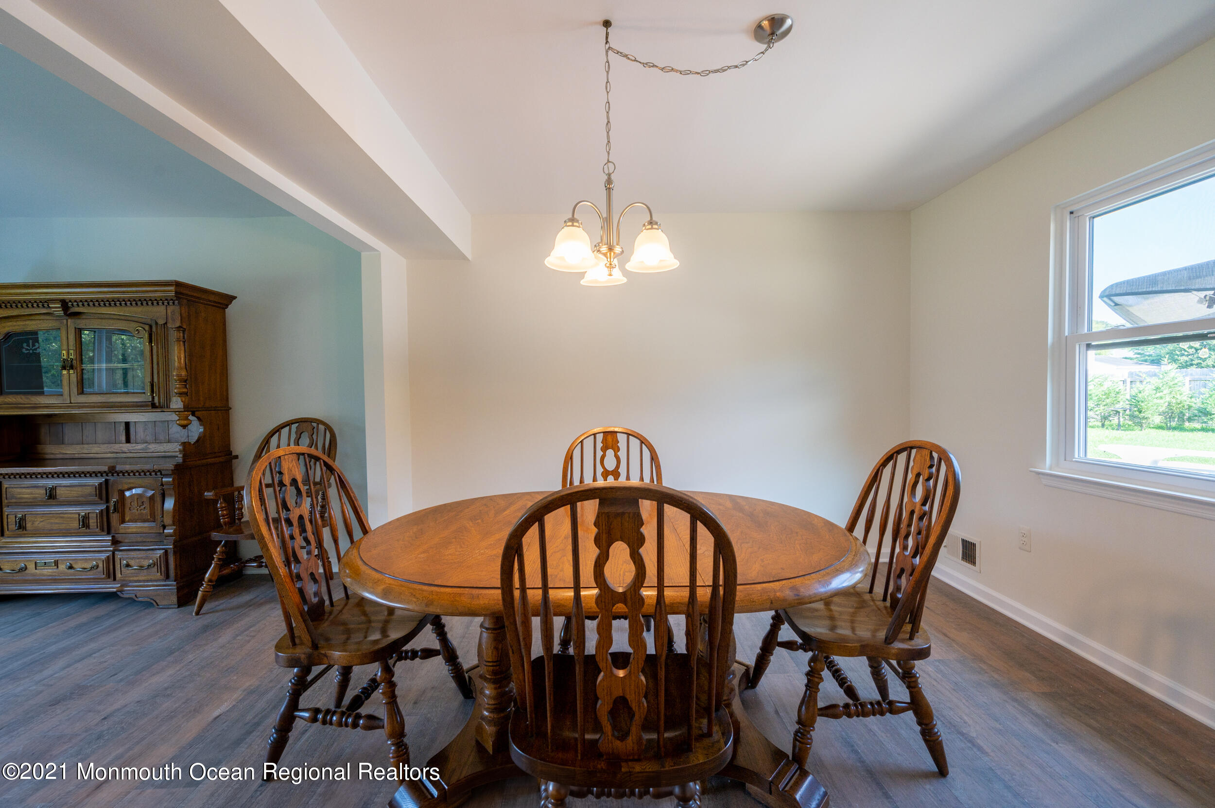 7 New Friendship Road Howell, NJ 07731 - Photo 6 of 26 a view of a dining room with furniture and wooden floor