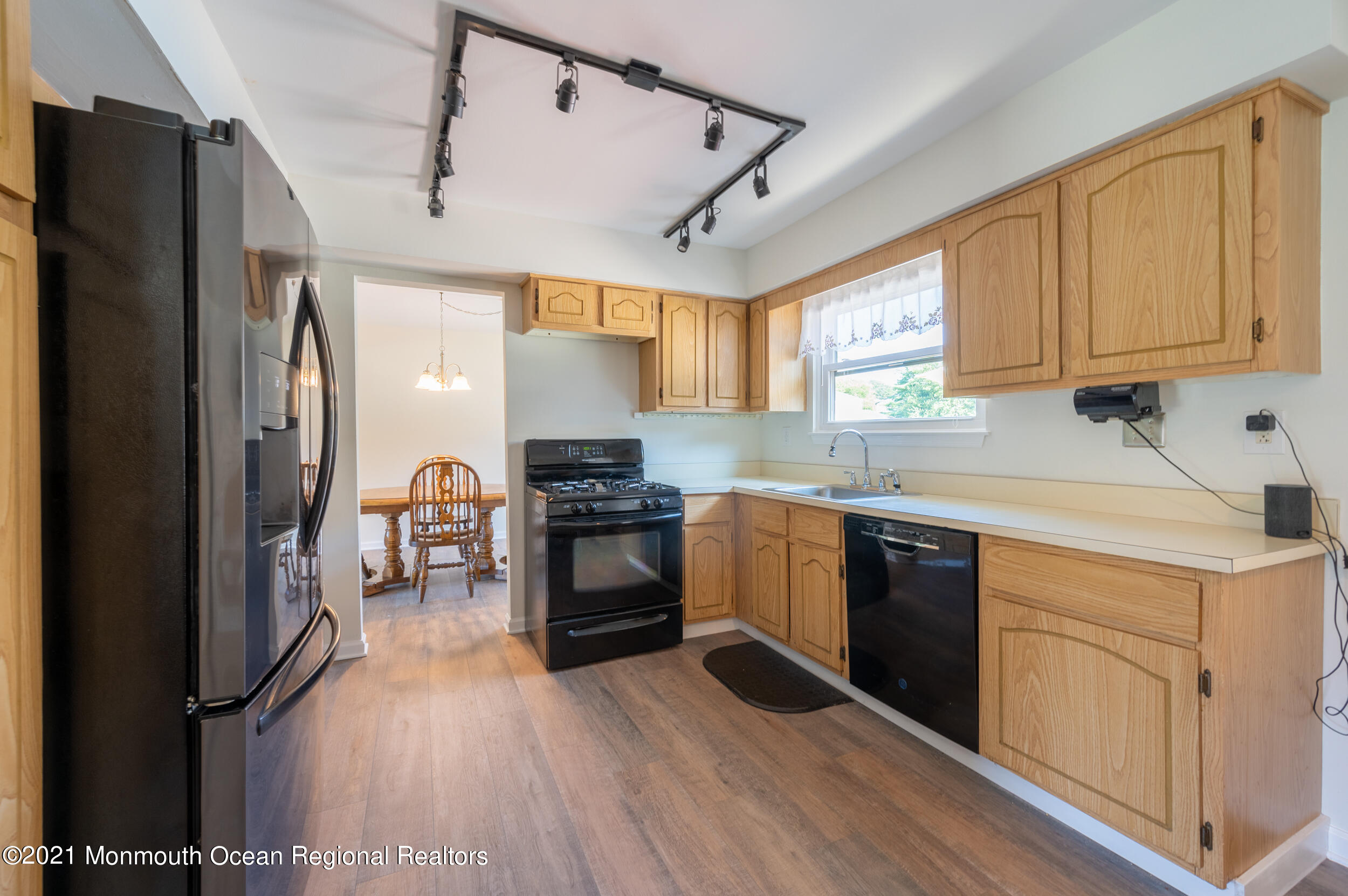 7 New Friendship Road Howell, NJ 07731 - Photo 8 of 26 a kitchen with granite countertop a refrigerator stove and sink