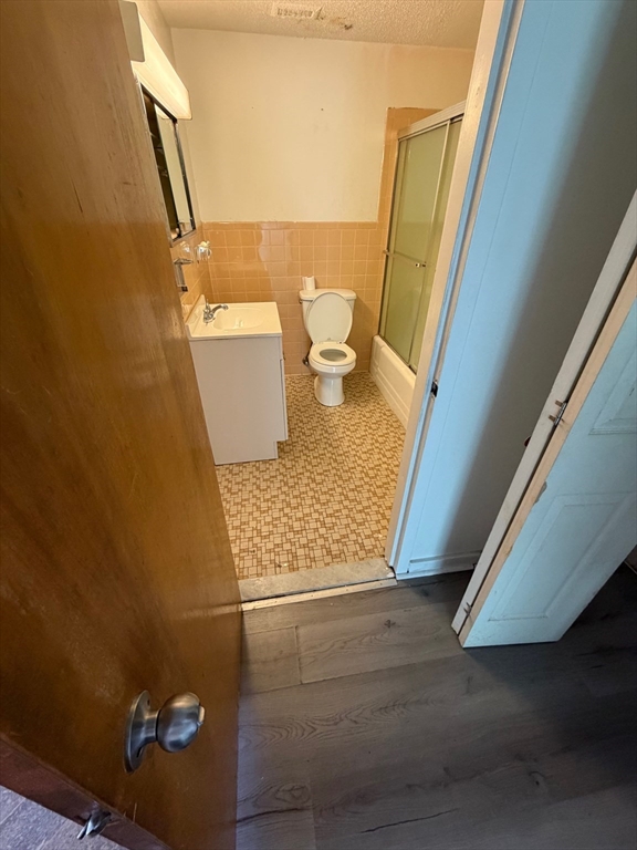 101 Mulberry Street, Unit 314 Springfield, MA 01105 - Photo 3 of 8 a bathroom with a sink and a toilet