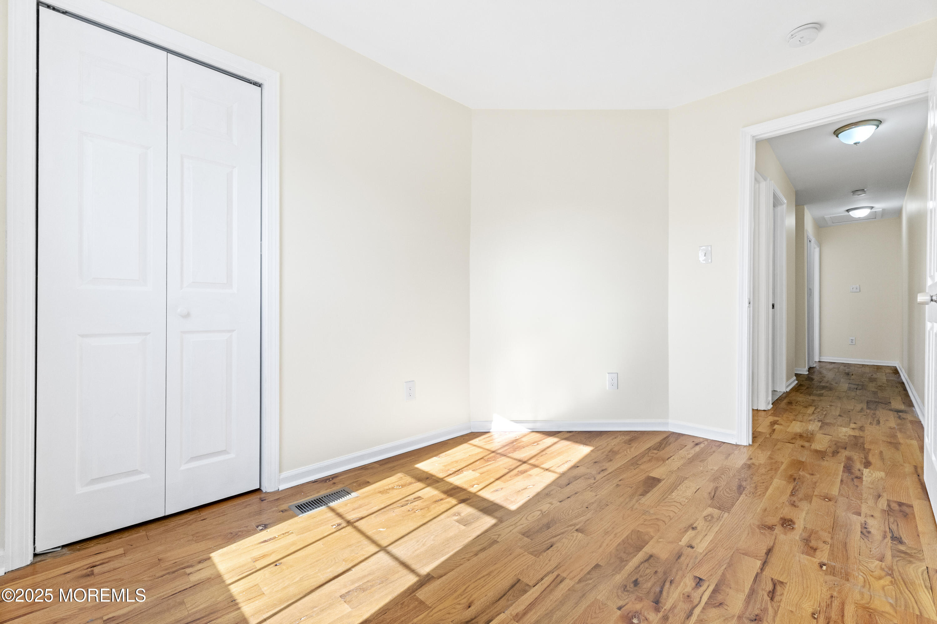 12 Carmella Court Newark, NJ 07104 - Photo 21 of 41 a view of a room with wooden floor