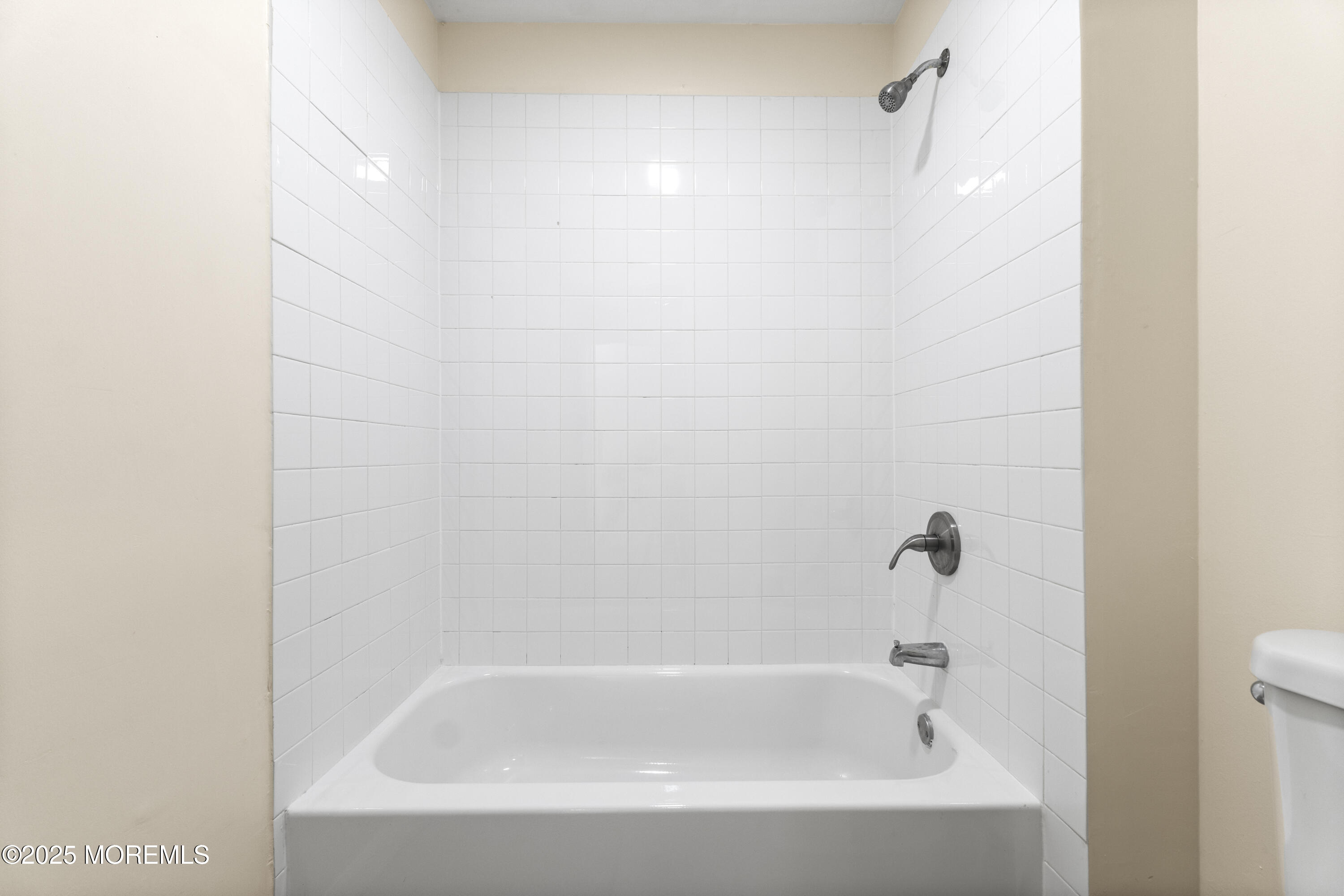 12 Carmella Court Newark, NJ 07104 - Photo 27 of 41 a close up of a bathtub curtain