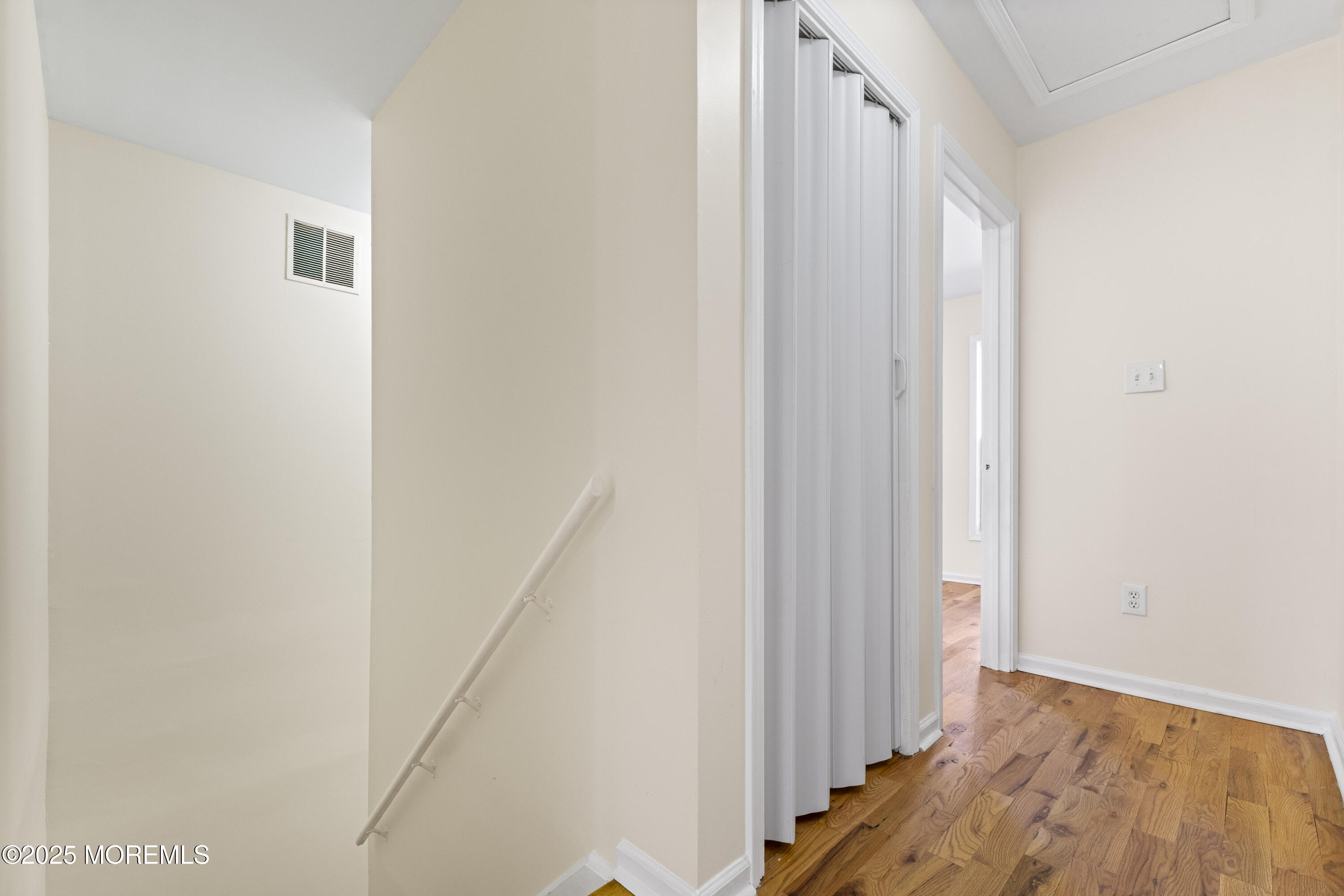 12 Carmella Court Newark, NJ 07104 - Photo 35 of 41 a view of a hallway with wooden floor and entryway